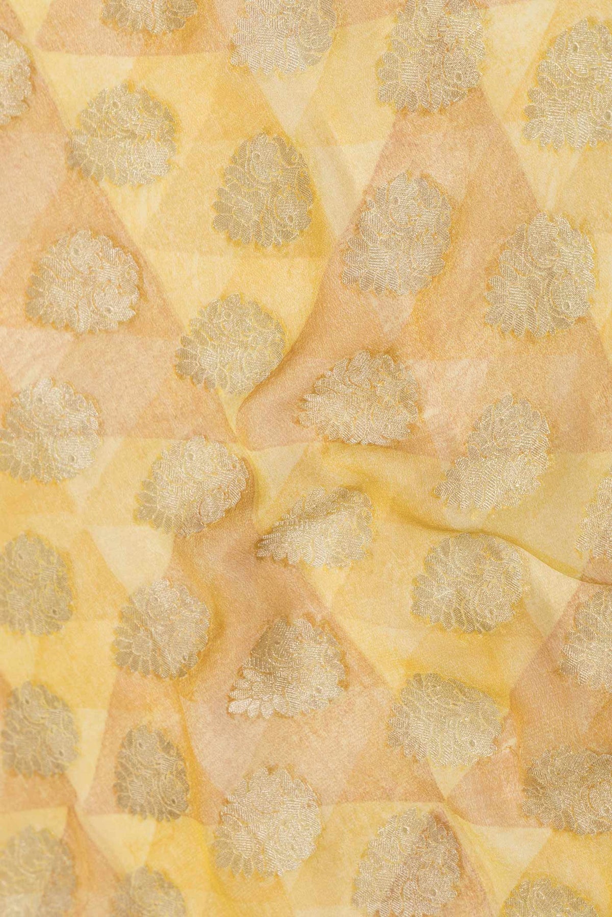 Close up of Mustard Dual Tone Georgette Saree with Printed design on the body and Zari Border displaying folds