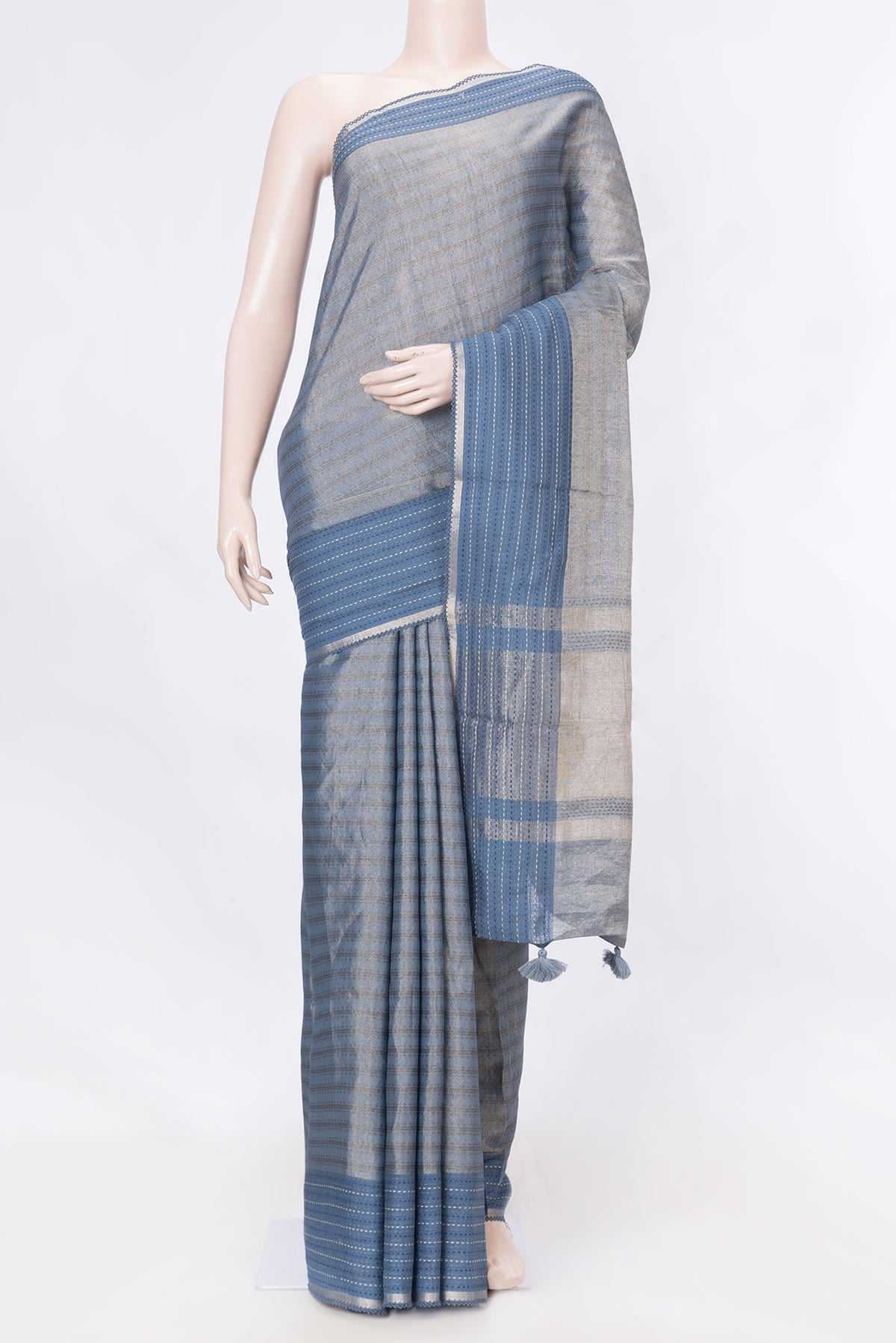 Blue Dual Tone Tussar Saree with Zari Brocade on the body and Embroidery Border displayed on a mannequin