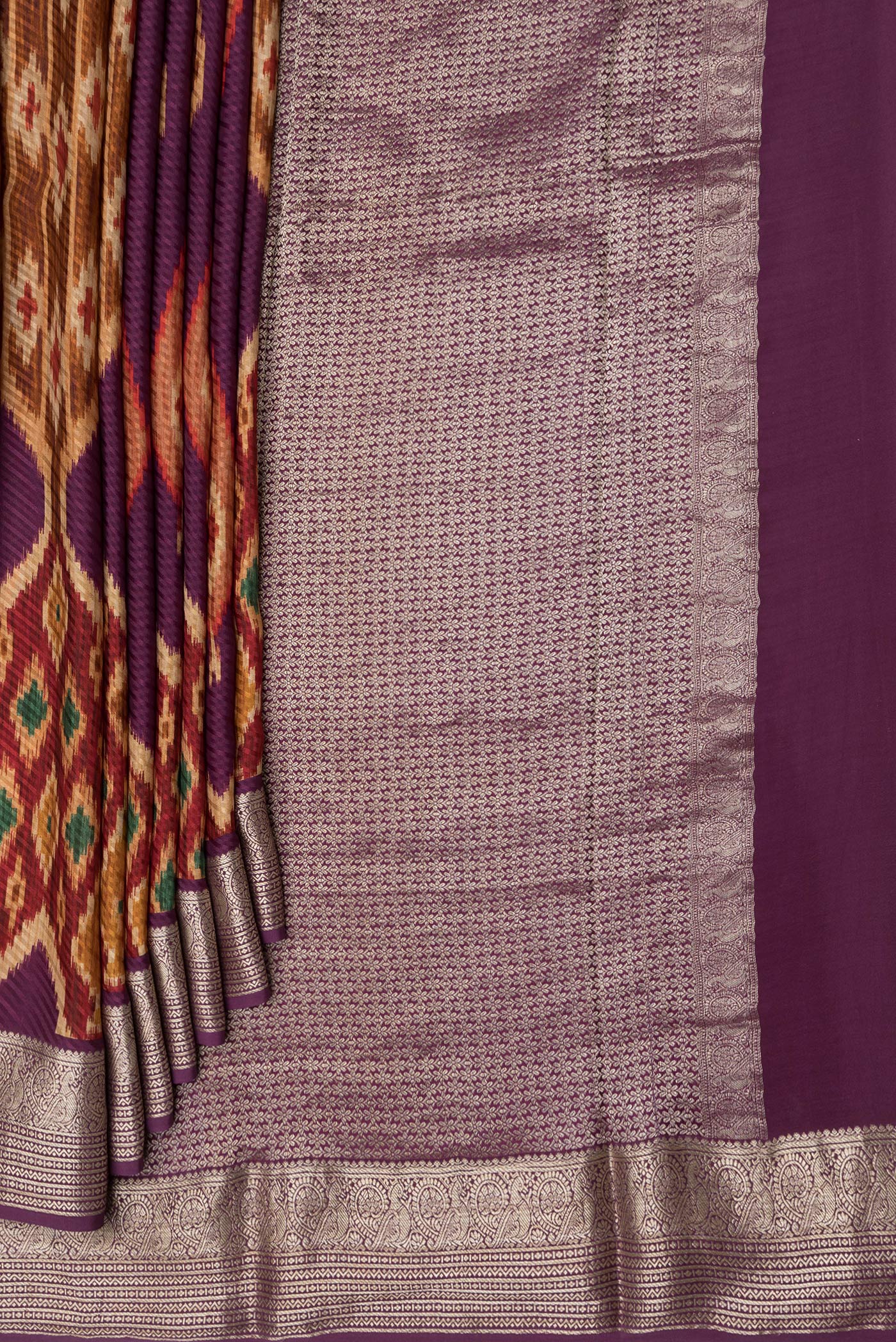 Pleats and pallu of Purple Mysore Crepe Saree with Printed design on the body and Zari Border. 