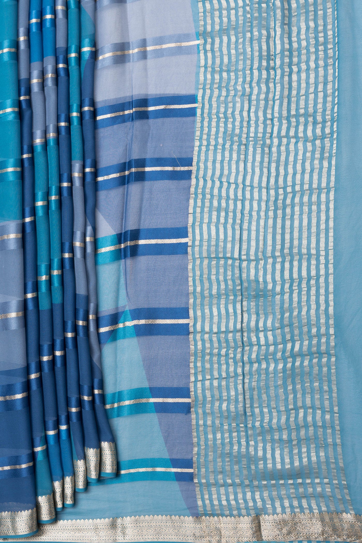 Pleats and pallu of Peacock Blue Dual Tone Mysore Georgette Saree with Stripes on the body and Zari Border. 