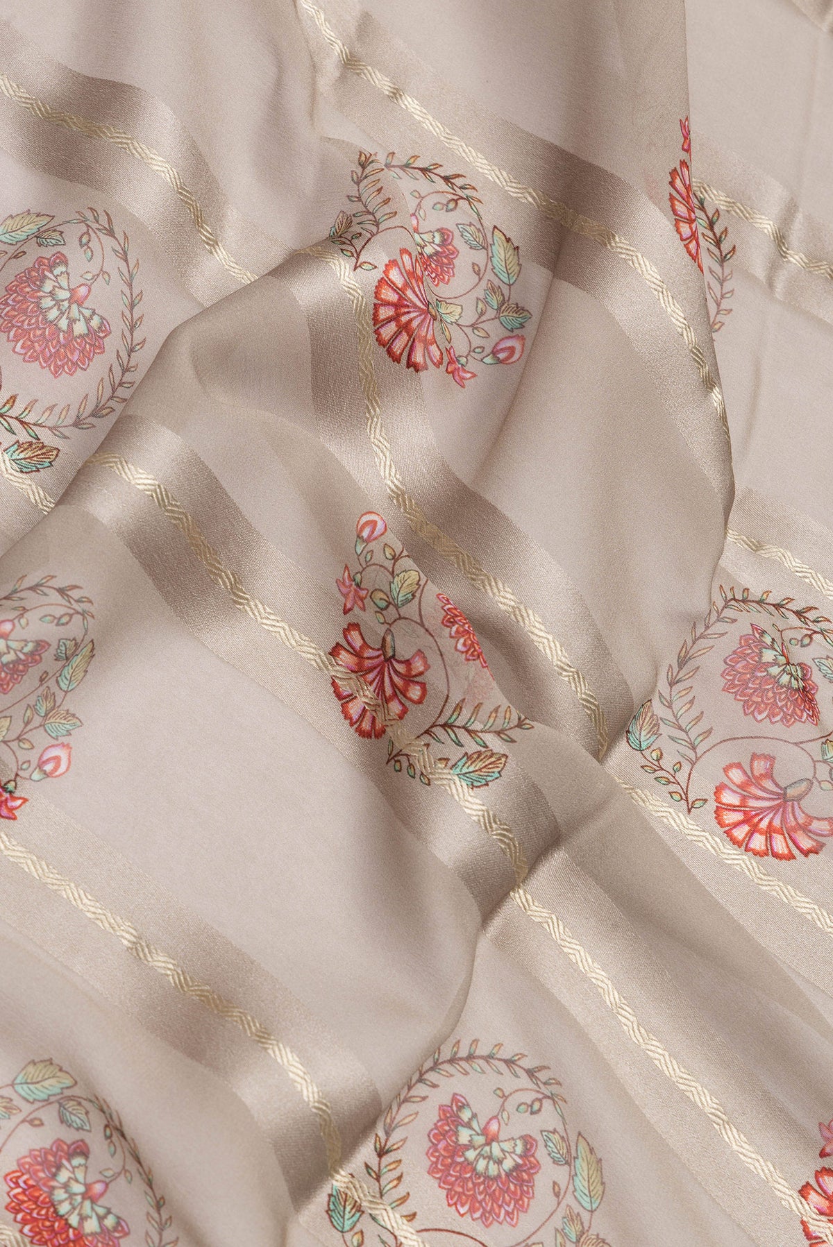 Close up of Grey Dual Tone Mysore Georgette Saree with Printed design on the body and Zari Border.  displaying folds