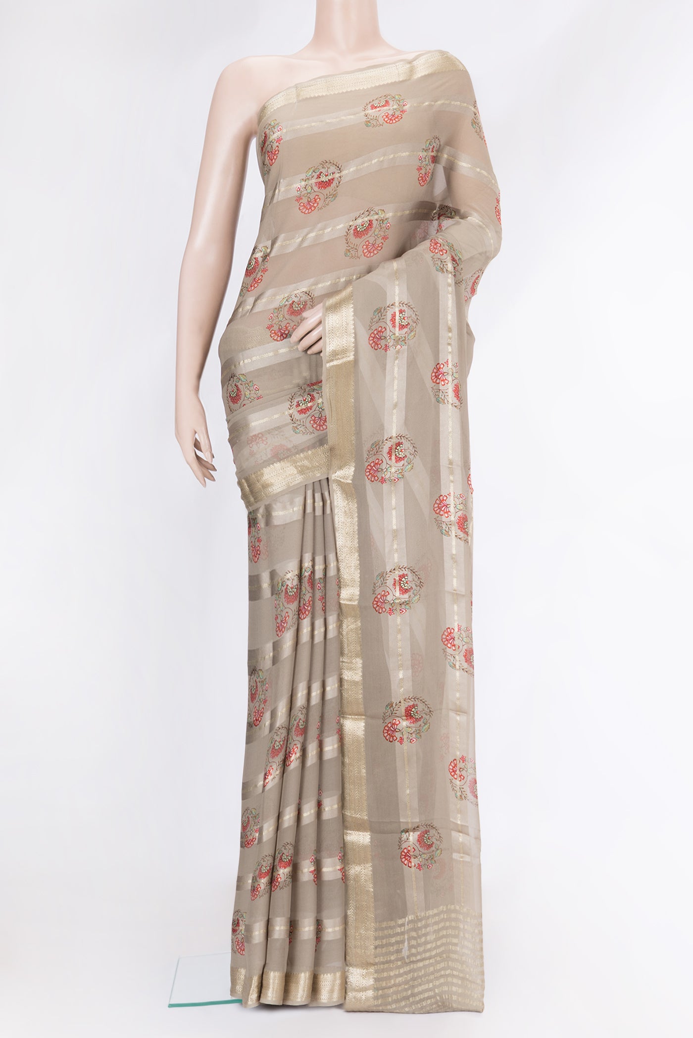 Grey Dual Tone Mysore Georgette Saree with Printed design on the body and Zari Border.  displayed on a mannequin