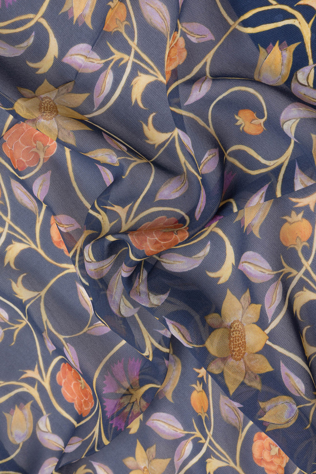 Close up of Navy Blue Dual Tone Mysore Crepe Saree with Printed design on the body and Thread Border.  displaying folds