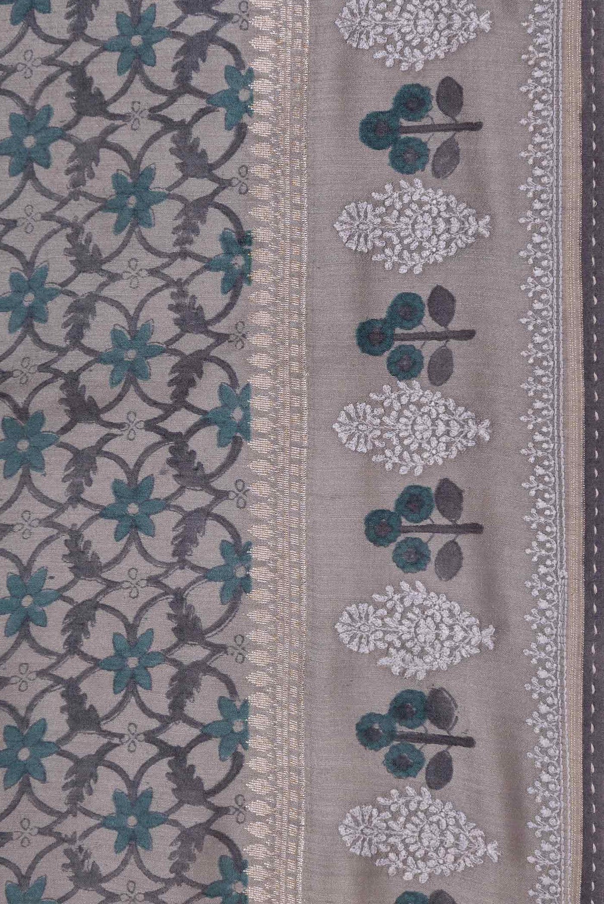 Border image of Grey Dual Tone Tussar Silk Saree with Printed design on the body and Embroidery Border