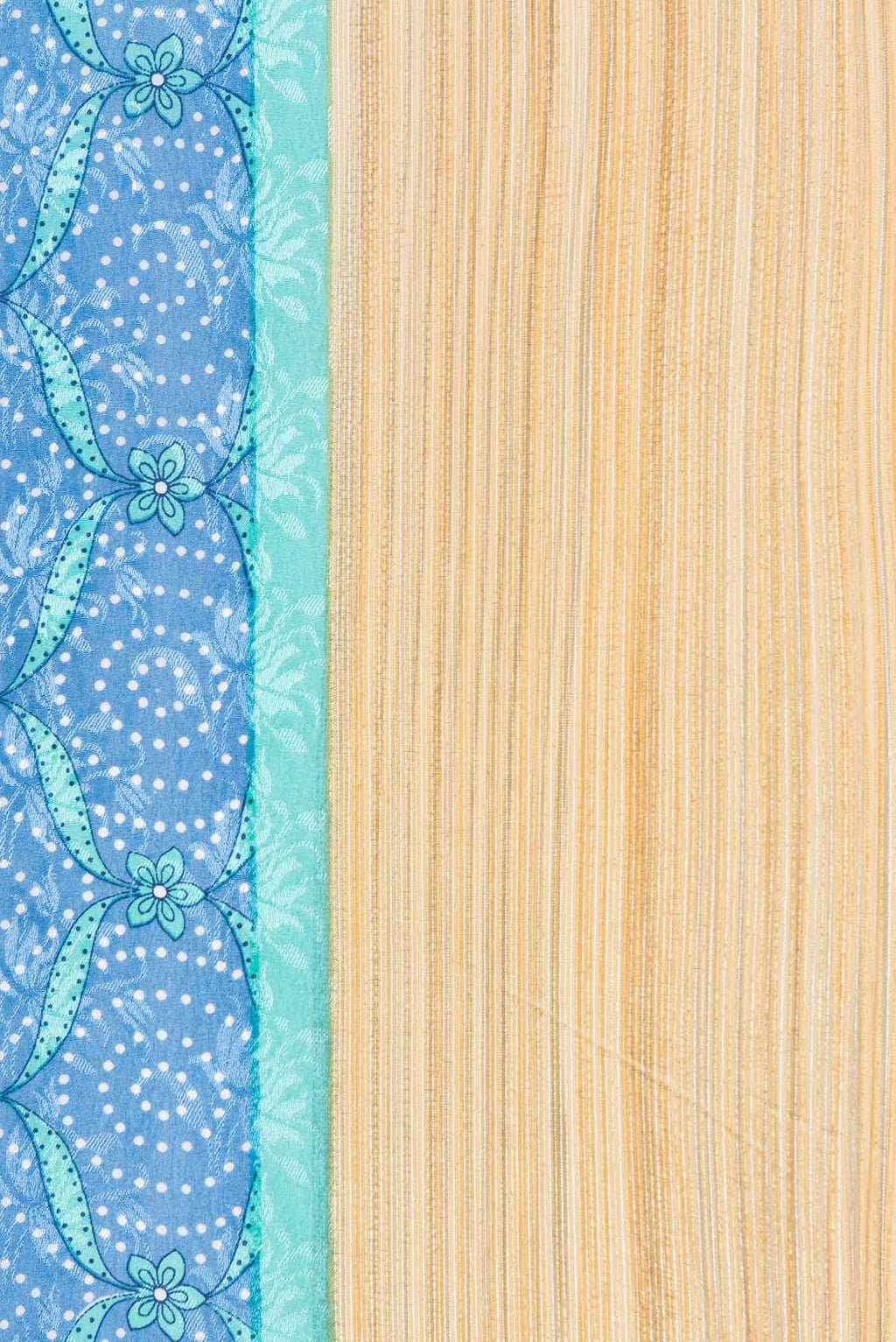 Border image of Sky Blue Dual Tone Mysore Crepe Saree with Printed design on the body and Zari Border. 