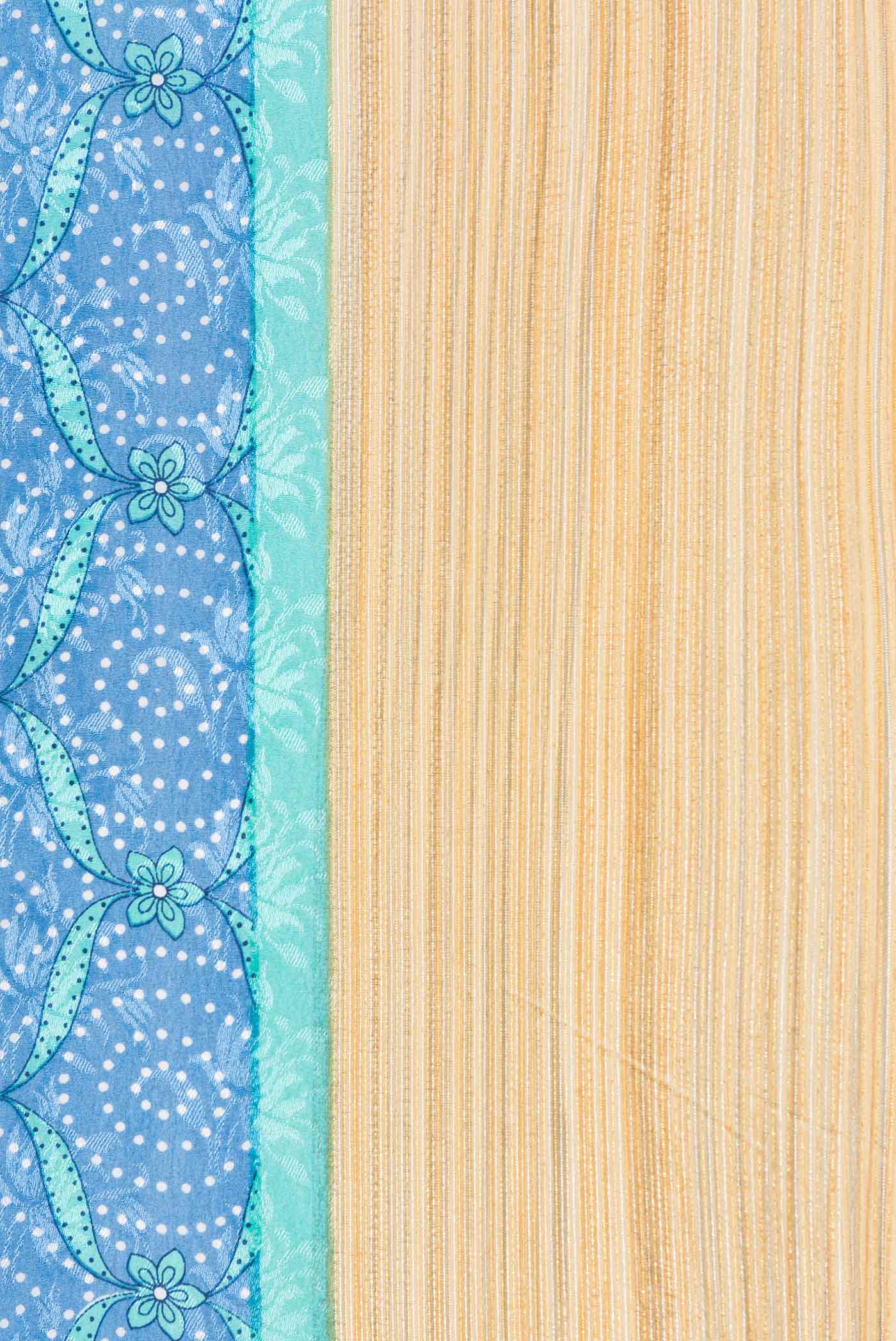 Border image of Sky Blue Dual Tone Mysore Crepe Saree with Printed design on the body and Zari Border. 