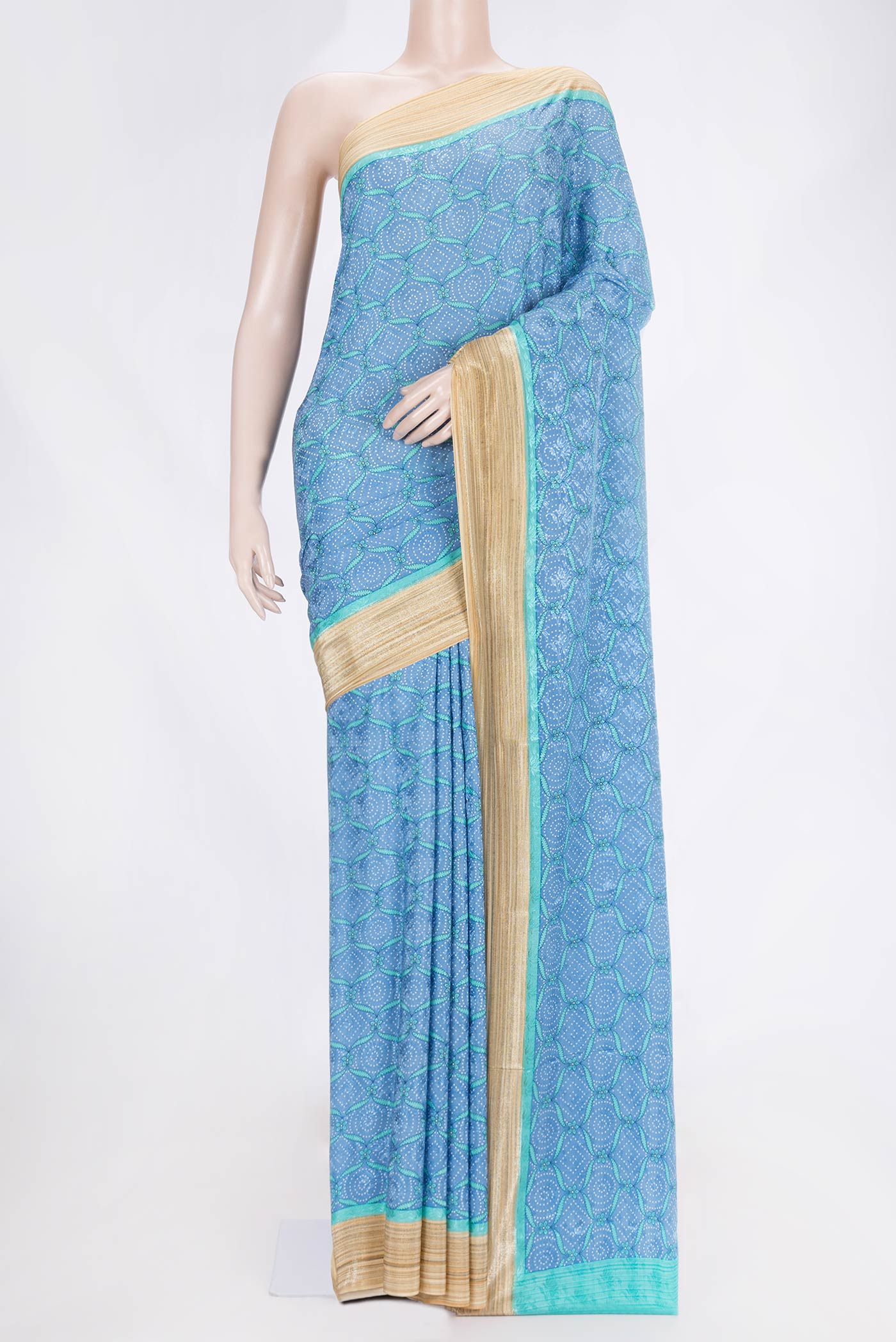 Sky Blue Dual Tone Mysore Crepe Saree with Printed design on the body and Zari Border.  displayed on a mannequin
