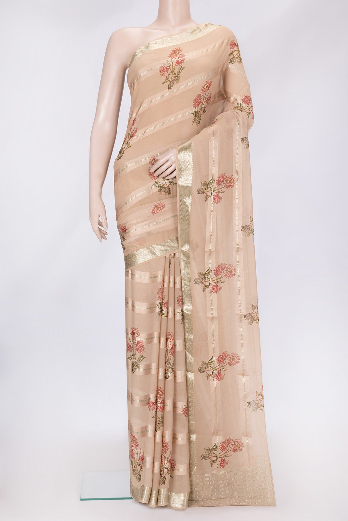 Peach Dual Tone Mysore Georgette Saree with Stripes on the body and Zari Border.  displayed on a mannequin