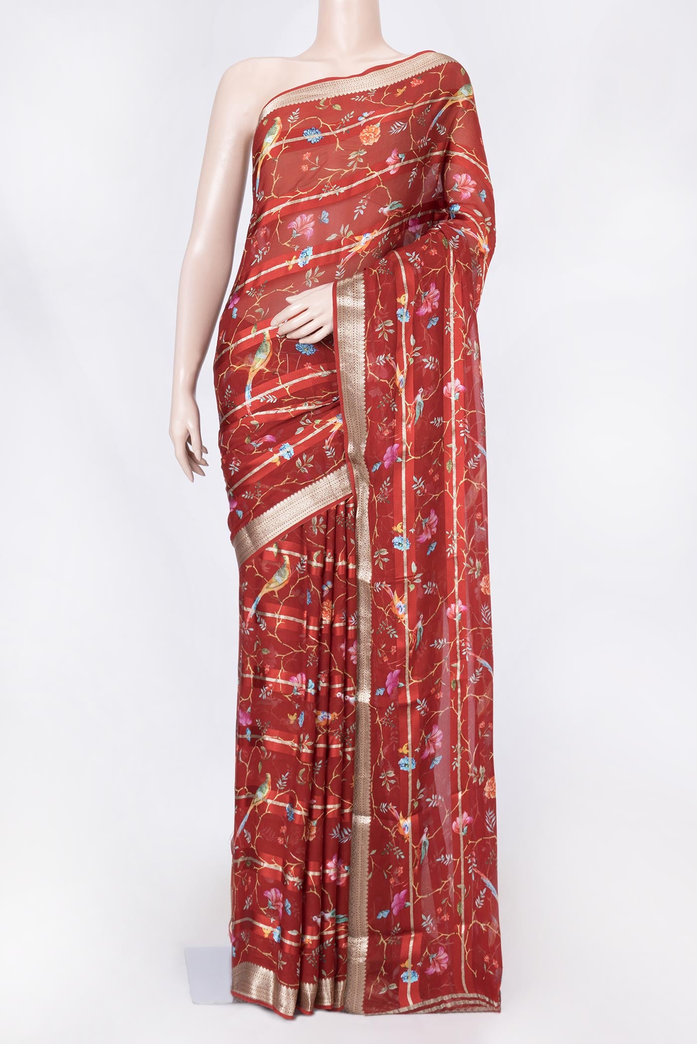Maroon Dual Tone Mysore Georgette Saree with Printed design on the body and Zari Border displayed on a mannequin