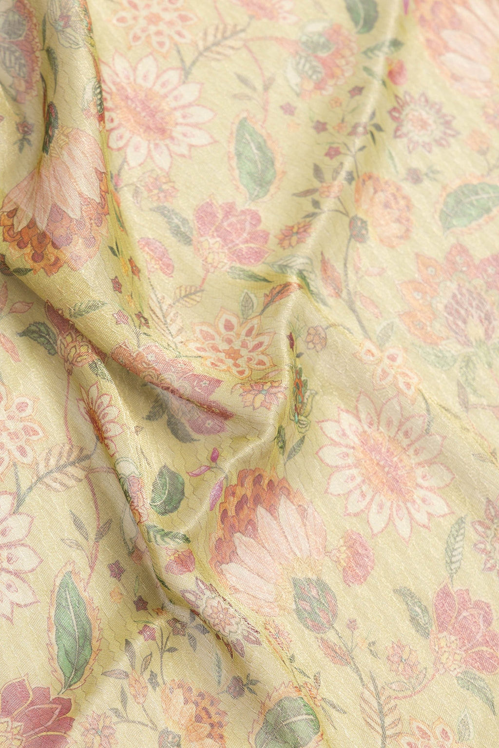 Close up of Pista Green Dual Tone Mysore Georgette Saree with Printed design on the body and Fancy Border.  displaying folds
