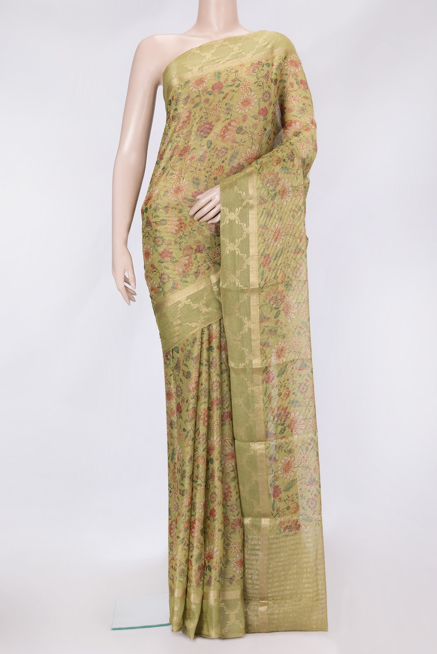 Pista Green Dual Tone Mysore Georgette Saree with Printed design on the body and Fancy Border.  displayed on a mannequin