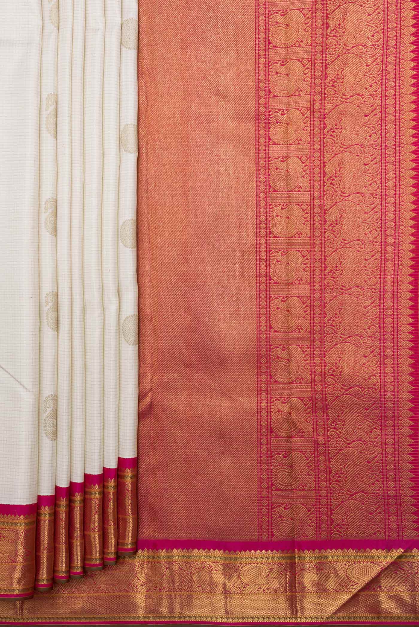 Pleats and pallu of Pure Silk Pure Zari White Dual Tone Kanchipuram Saree with Checked design on the body and Zari Border
