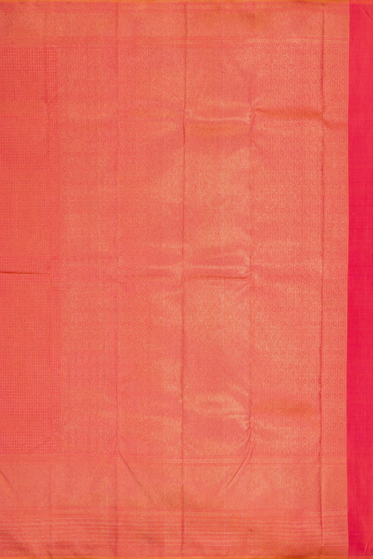 Close up image of the pallu of Brick Orange Dual Tone Kanjivaram Silk Saree with Zari Brocade on the body and Fancy Border. 