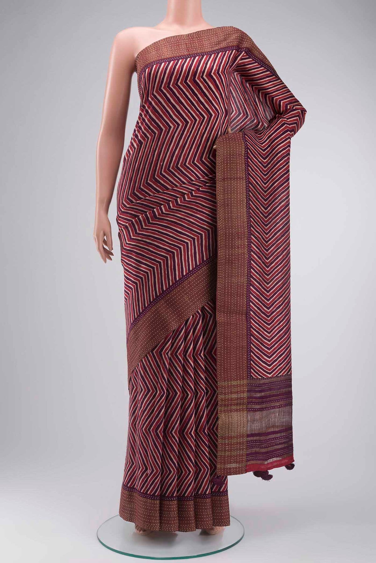 Multi Color Tussar Silk Saree with Stripes on the body and Thread Border displayed on a mannequin