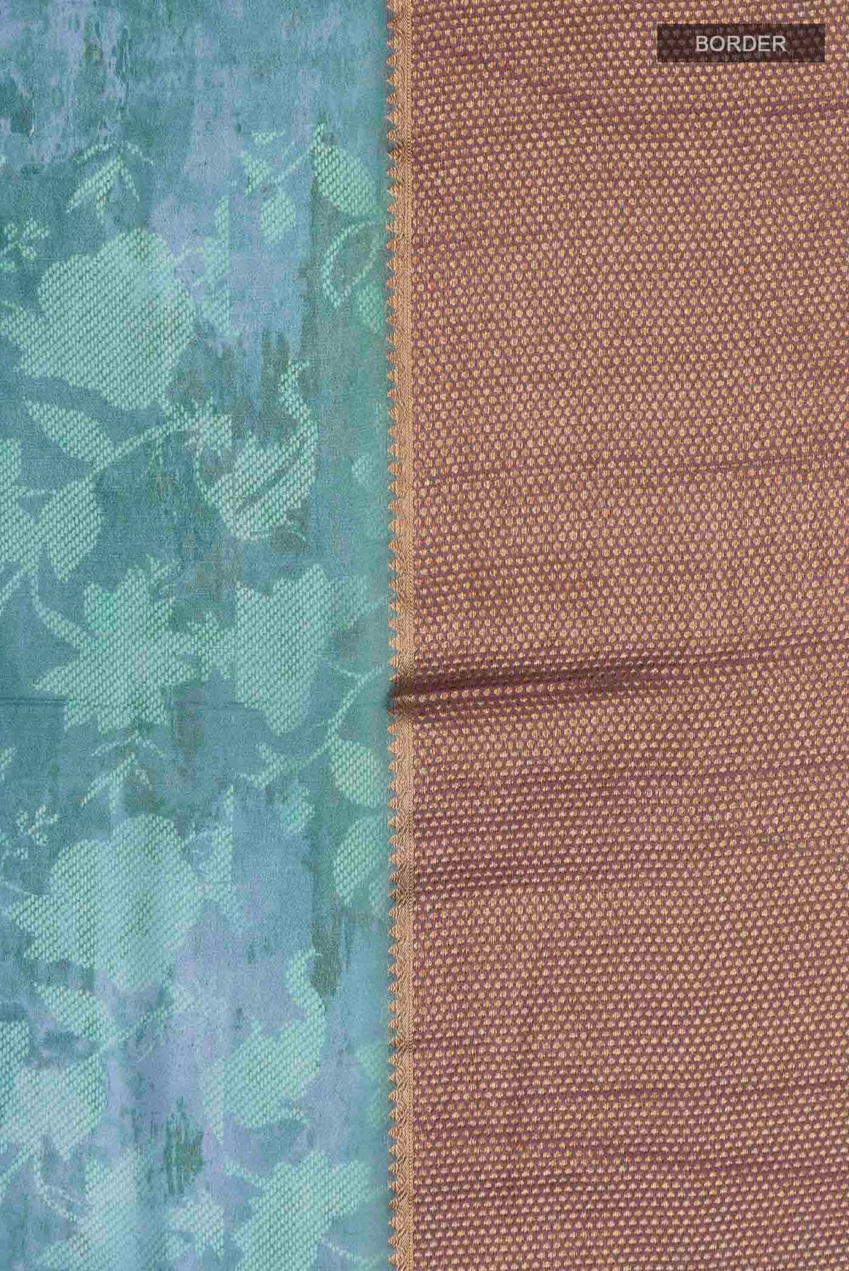 Border image of Blue Mysore Crepe Saree with Printed design on the body and Zari Border