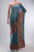 Blue Mysore Crepe Saree with Printed design on the body and Zari Border displayed on a mannequin