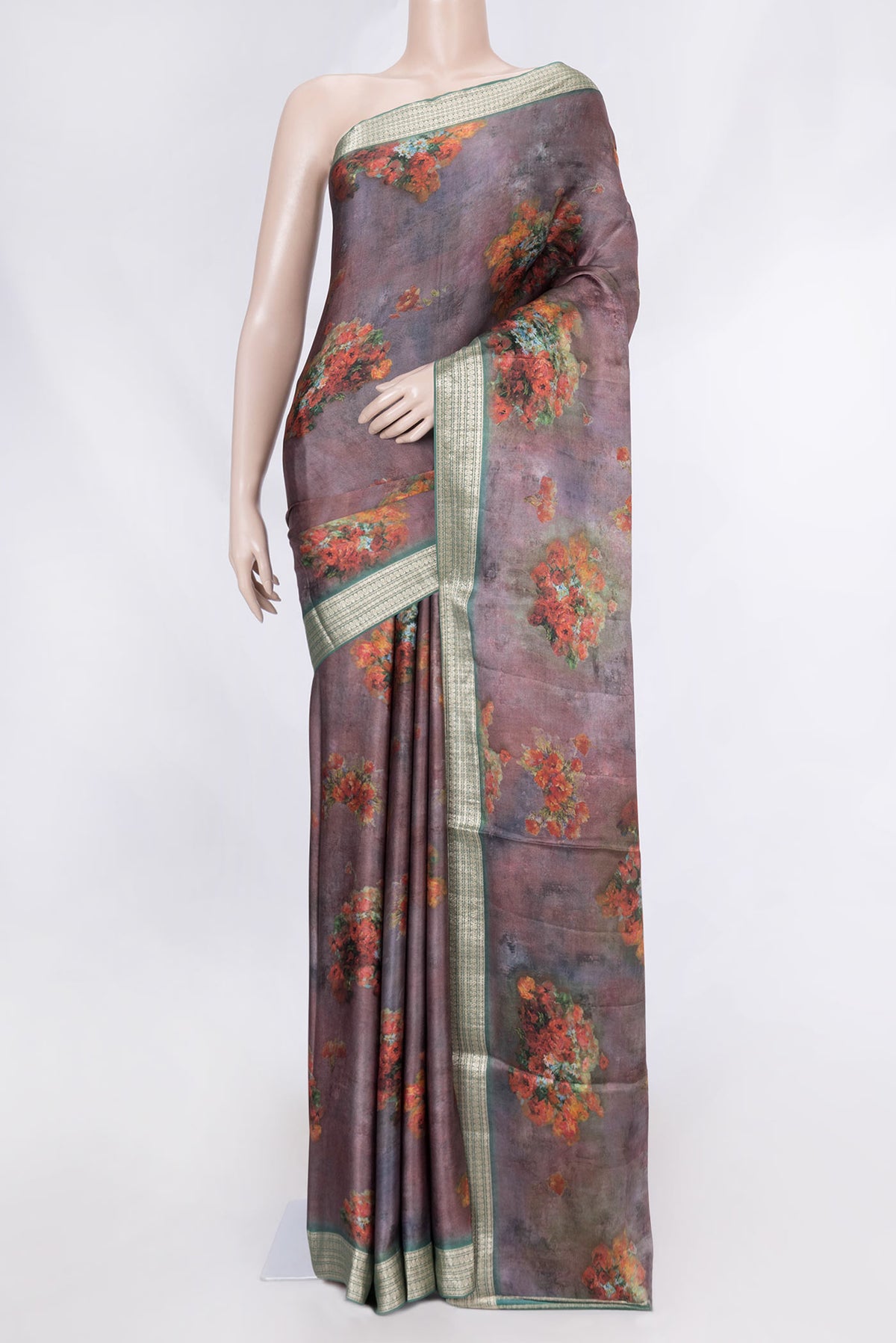 Mauve Satin Silk Saree with Floral Print on the body and Zari Border displayed on a mannequin