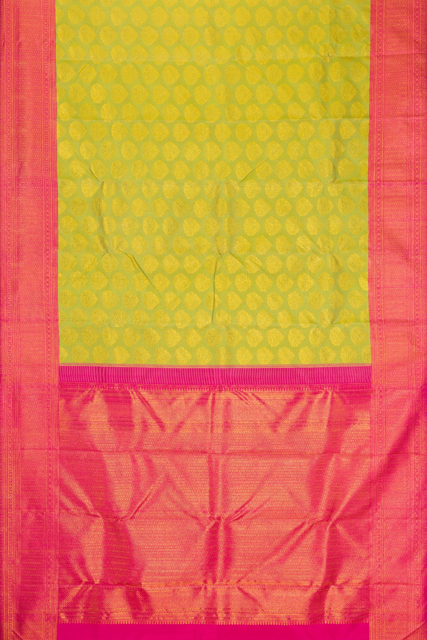 Flat view of Parrot Green Dual Tone Kanjivaram Silk Saree with Zari Butta on the body and Zari Border. 