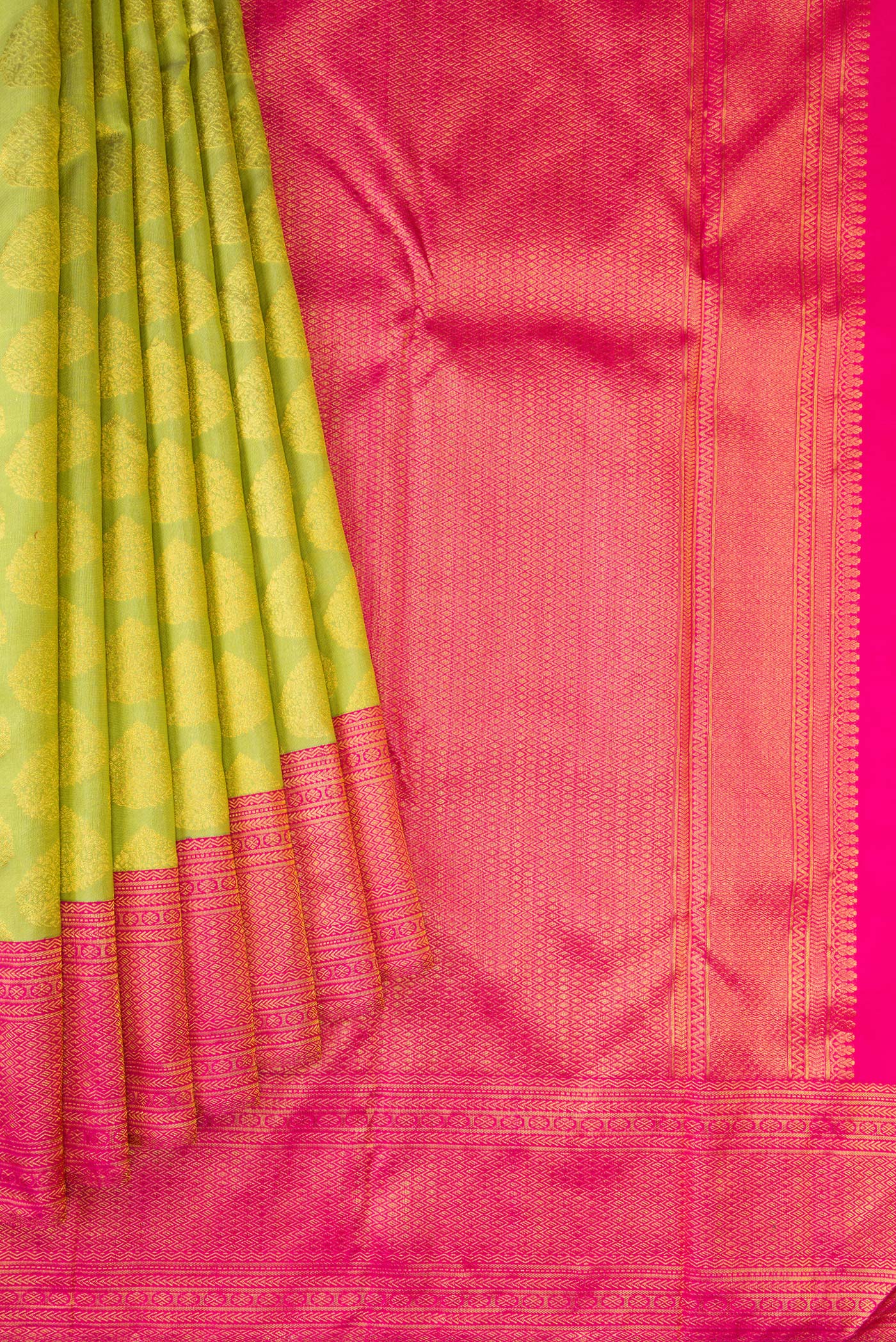 Pleats and pallu of Parrot Green Dual Tone Kanjivaram Silk Saree with Zari Butta on the body and Zari Border. 