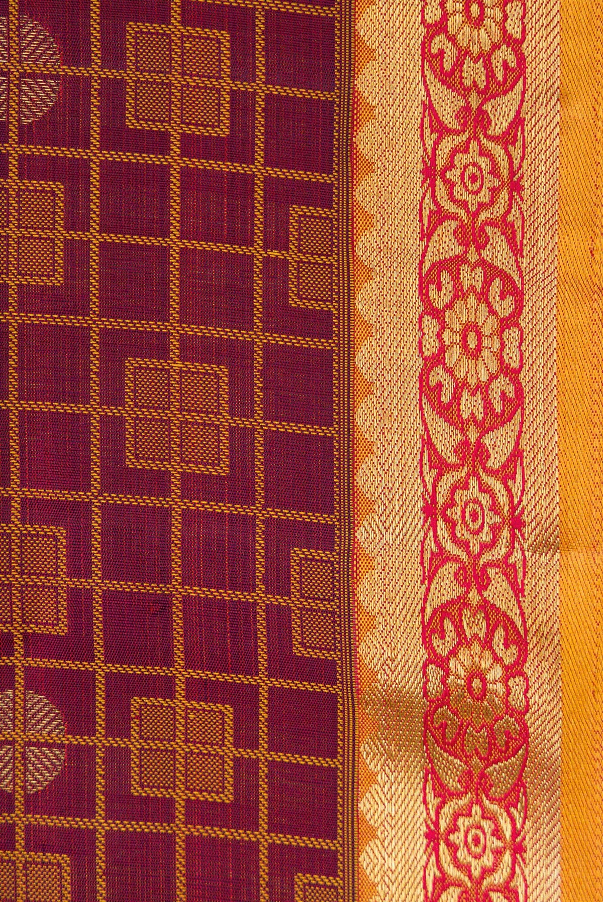 Border image of Maroon Dual Tone Kanchipuram Silk Saree with Jacquard design on the body and Zari Border. 