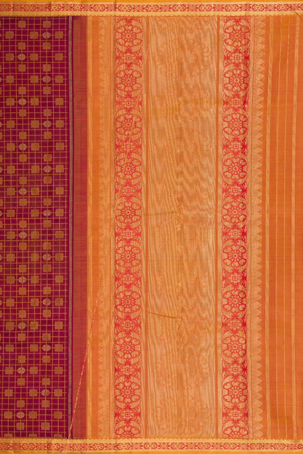 Close up image of the pallu of Maroon Dual Tone Kanchipuram Silk Saree with Jacquard design on the body and Zari Border. 