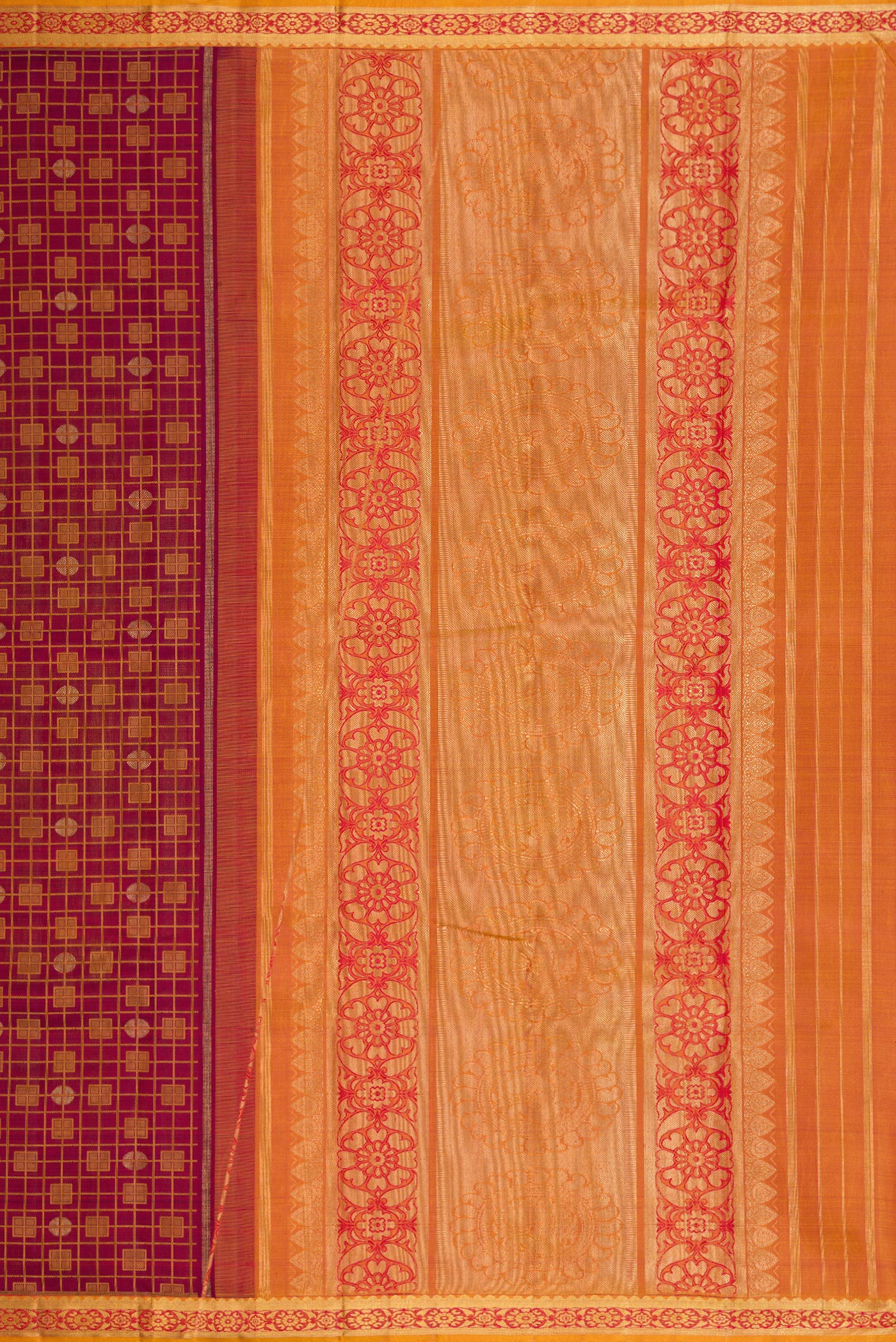 Close up image of the pallu of Maroon Dual Tone Kanchipuram Silk Saree with Jacquard design on the body and Zari Border. 