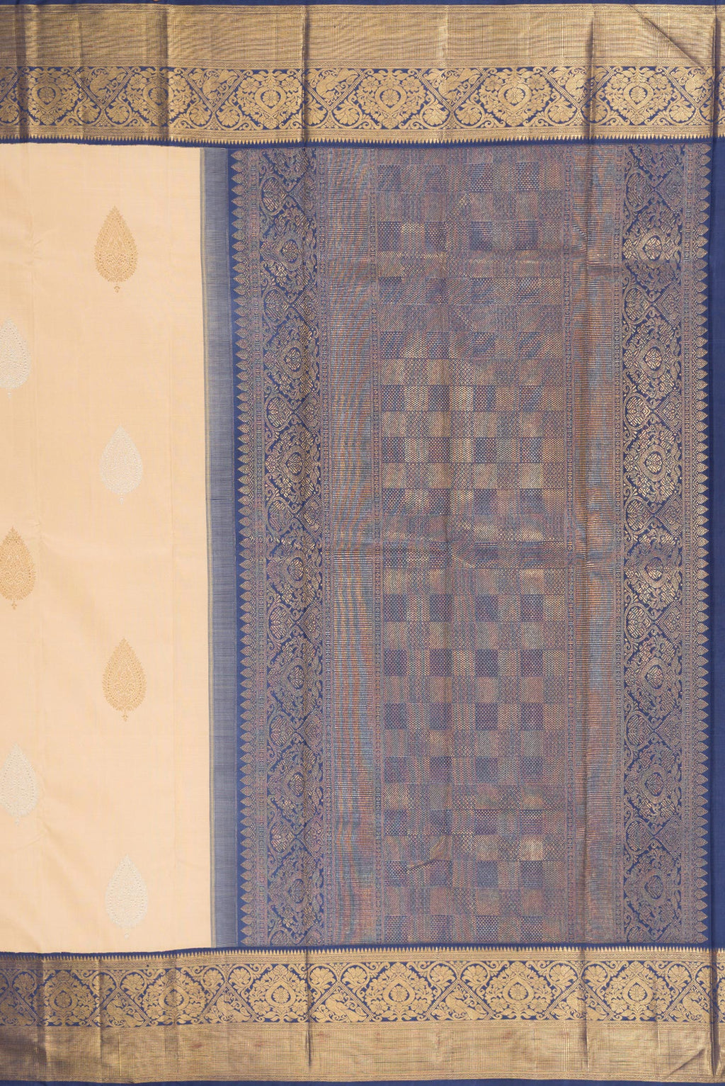 Close up image of the pallu of Pure Silk Pure Zari Beige Kanchipuram Saree with Zari Butta on the body and Zari Border. 