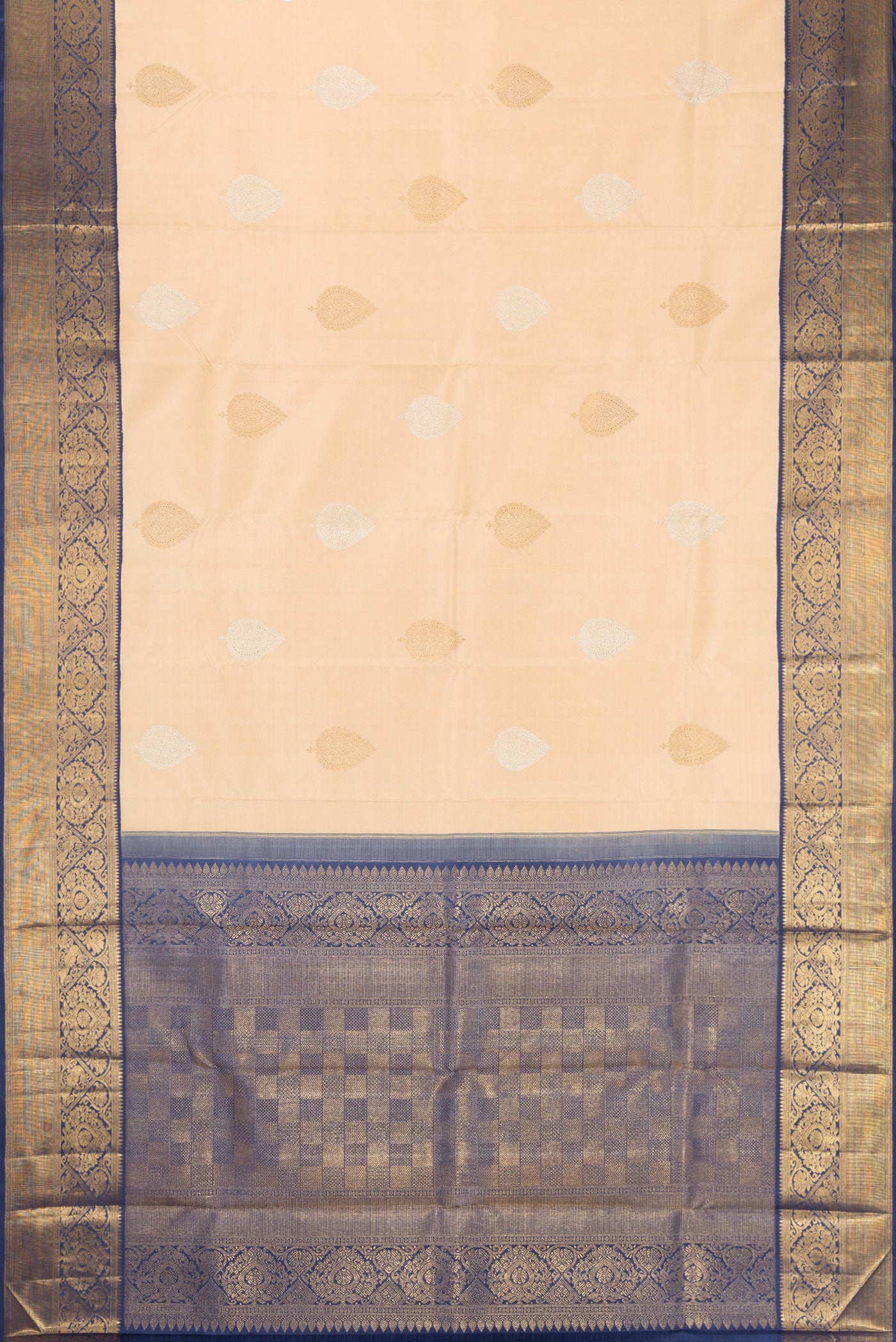 Flat view of Pure Silk Pure Zari Beige Kanchipuram Saree with Zari Butta on the body and Zari Border. 