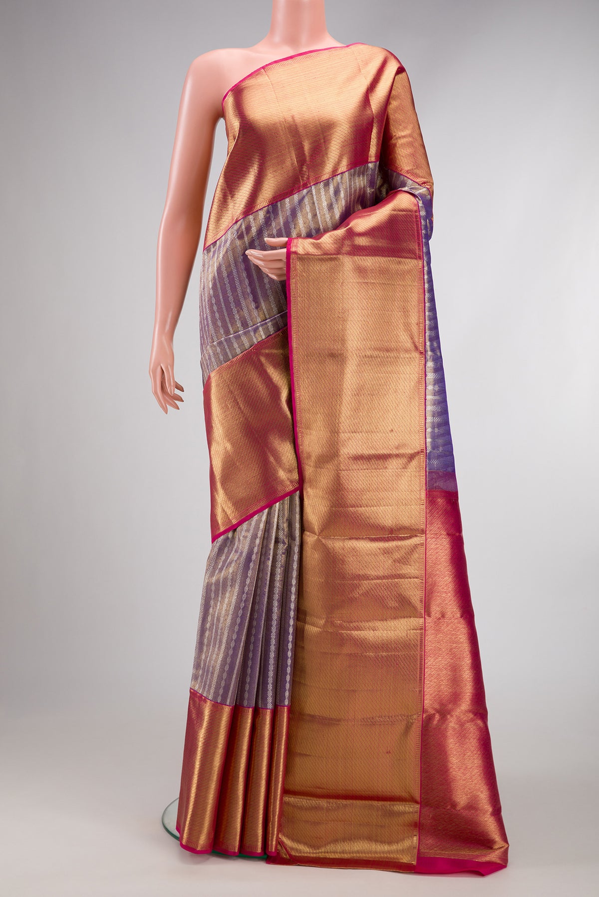 Purple Dual Tone Kanjivaram Tissue Silk Saree with Zari Brocade on the body and Zari Border.  displayed on a mannequin