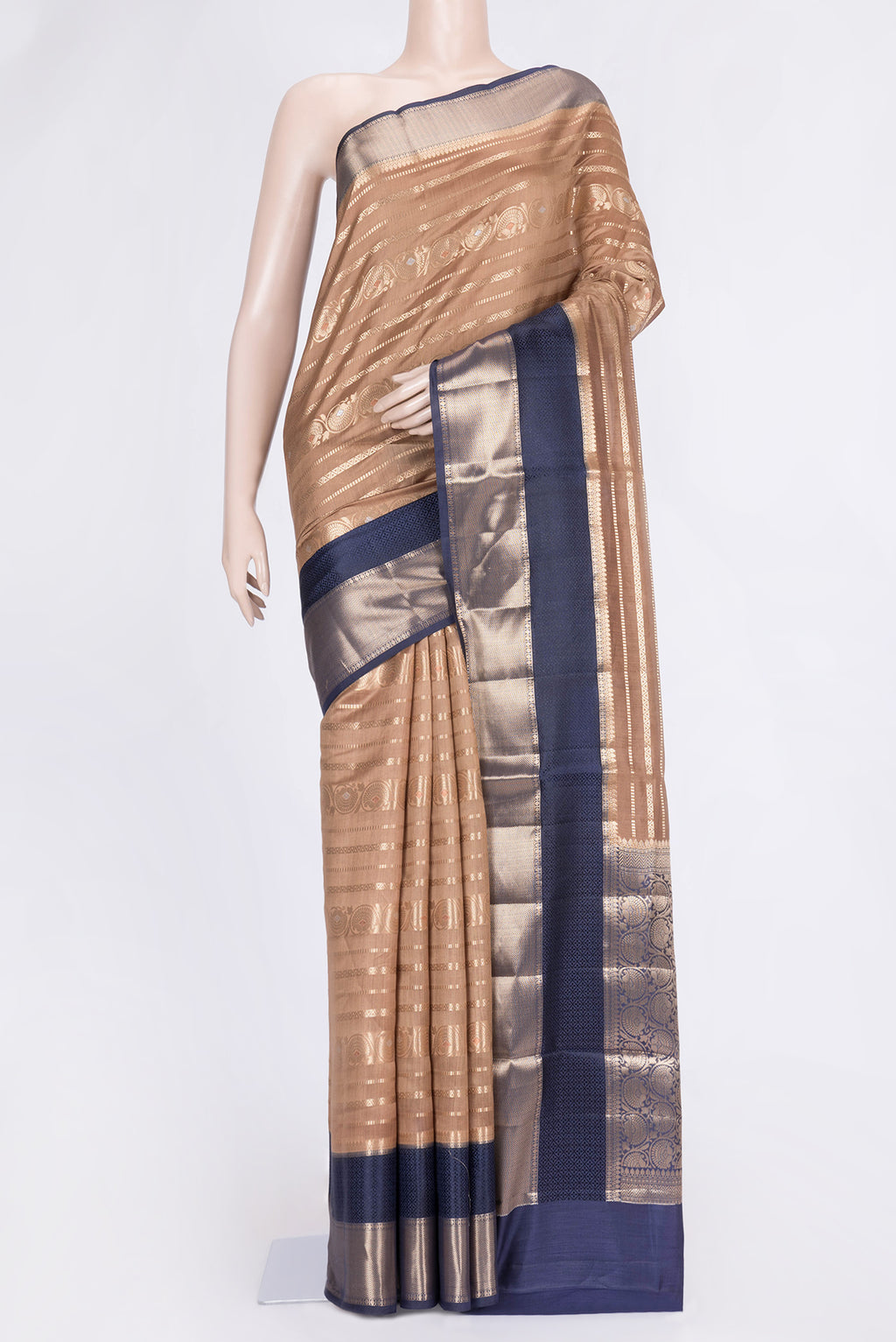 Brown Dual Tone Tussar Silk Saree with Stripes on the body and Zari Border.  displayed on a mannequin