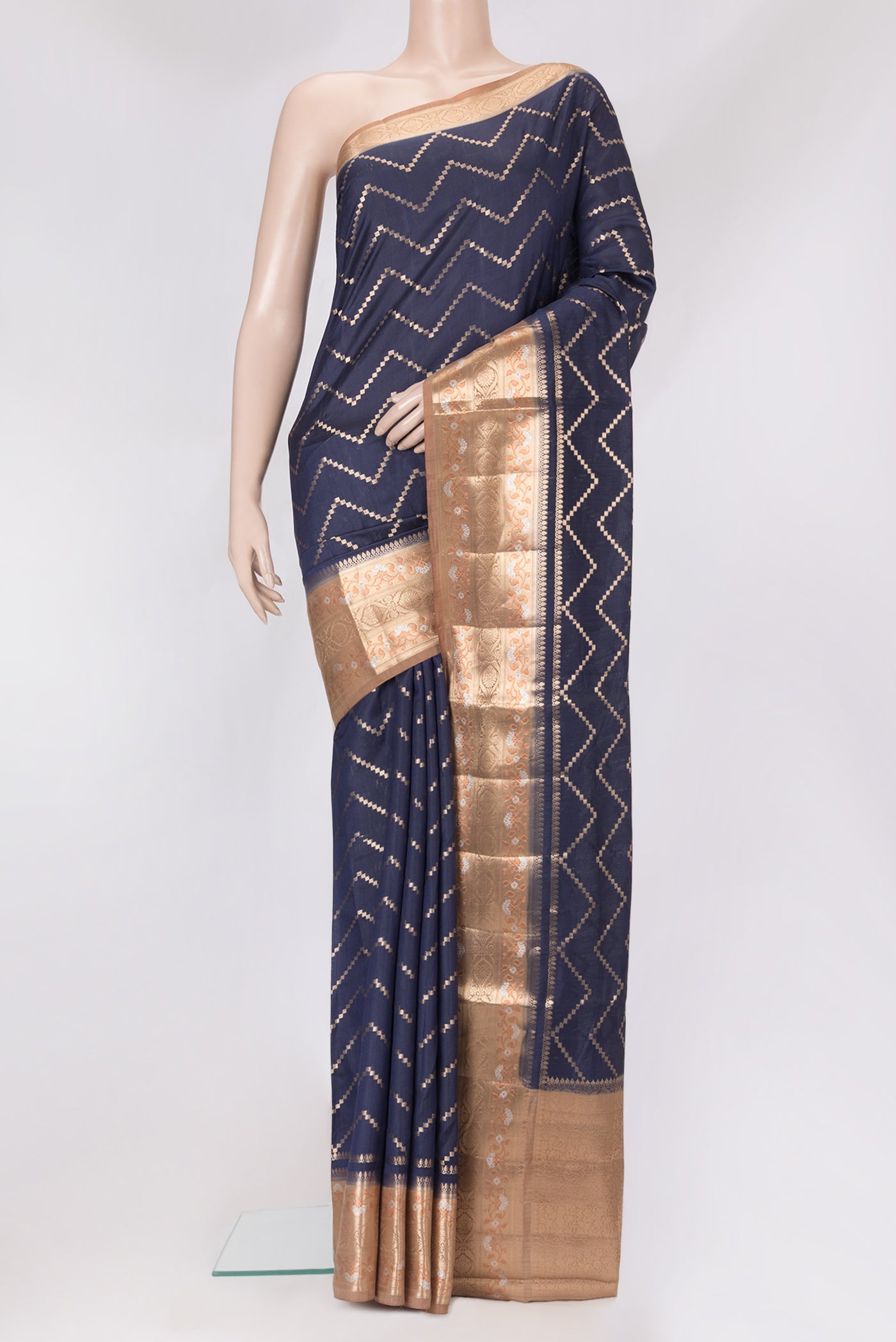 Navy Blue Dual Tone Tussar Silk Saree with Zari Brocade on the body and Zari Border.  displayed on a mannequin