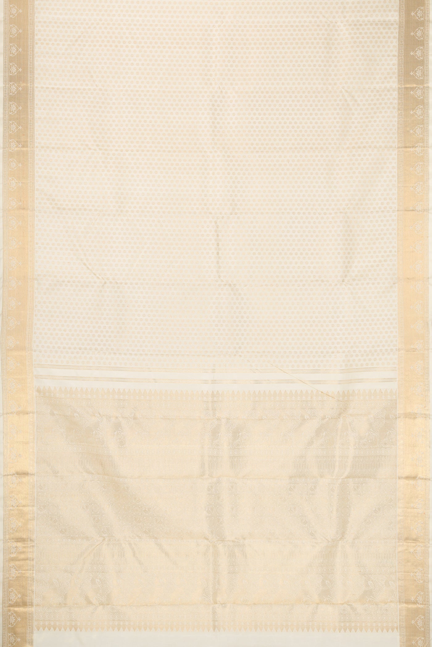 Flat view of Pure Silk Pure Zari Off White Dual Tone Kanjivaram Saree with Zari Brocade on the body and Zari Border. 