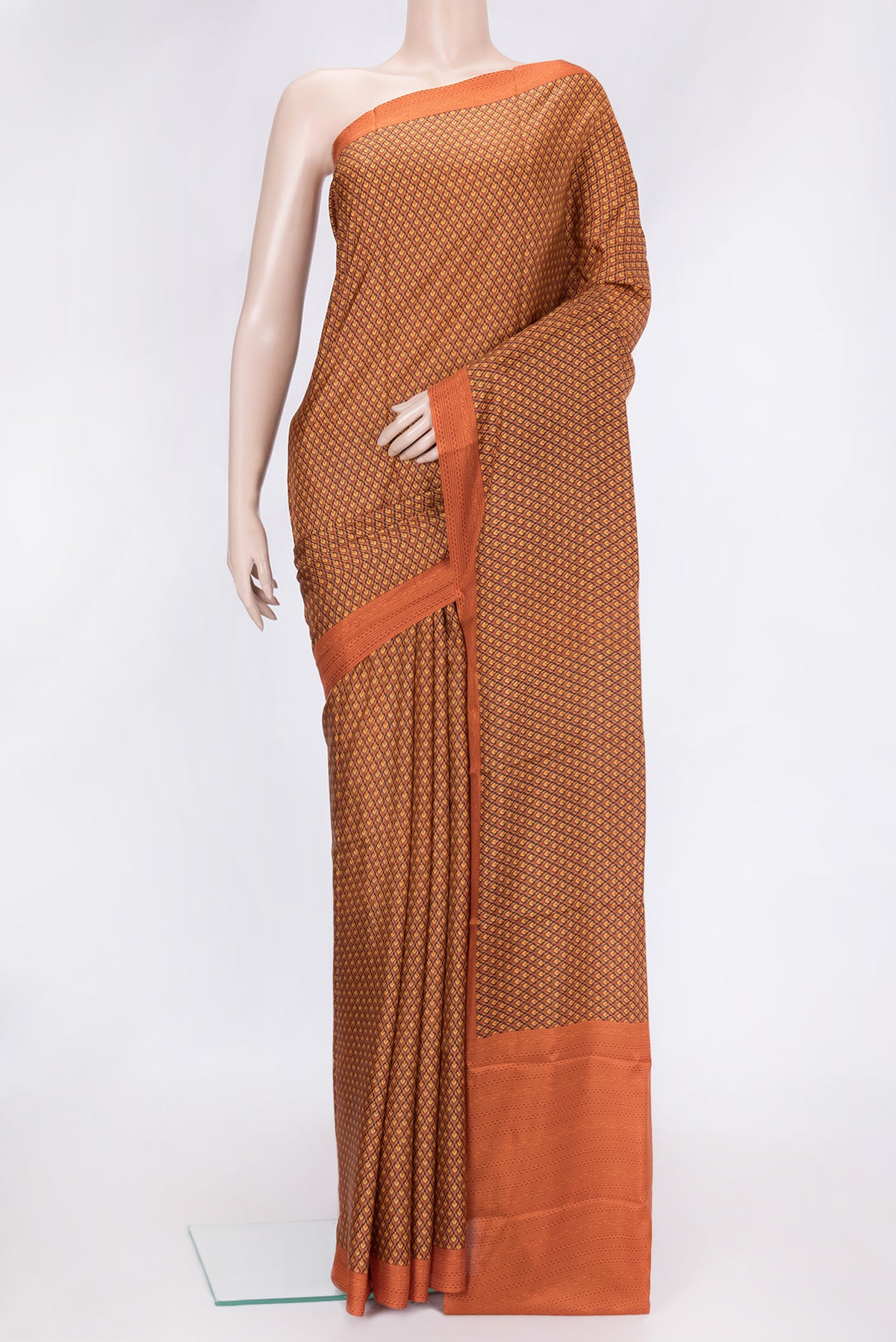 Peach Dual Tone Printed Silk Saree with Printed design on the body and Printed Border.  displayed on a mannequin