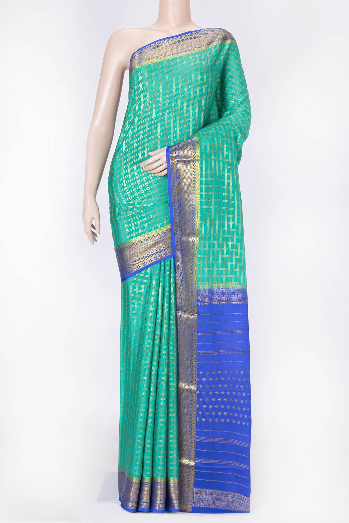 Sea Green Dual Tone Mysore Crepe Saree with Checked design on the body and Zari Border displayed on a mannequin