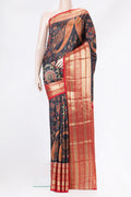 Black Dual Tone Kanjivaram Silk Saree with Printed design on the body and Zari Border.  displayed on a mannequin