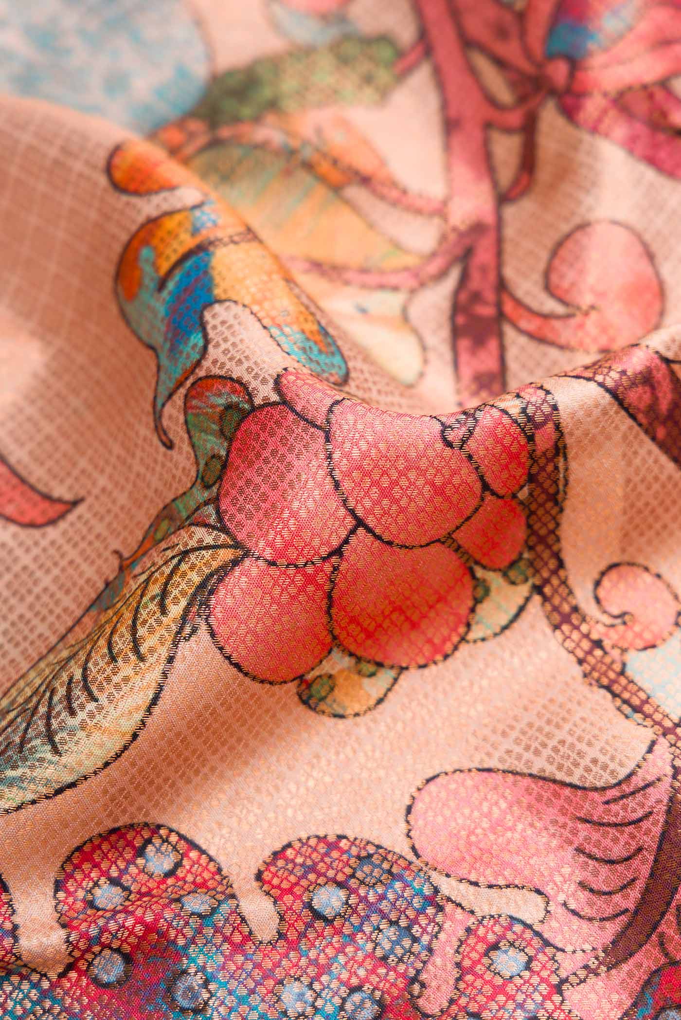 Close up of Rose Gold Dual Tone Kanjivaram Silk Saree with Printed design on the body and Zari Border.  displaying folds