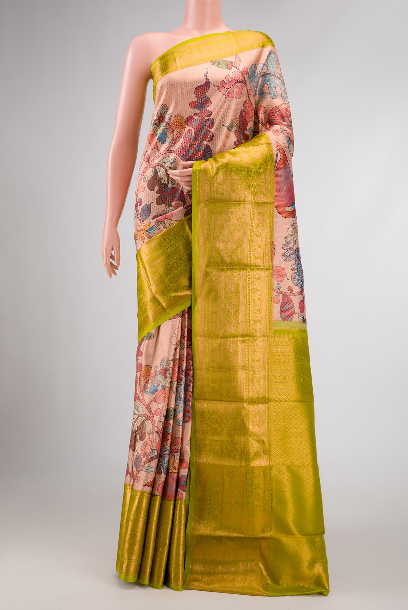 Rose Gold Dual Tone Kanjivaram Silk Saree with Printed design on the body and Zari Border.  displayed on a mannequin