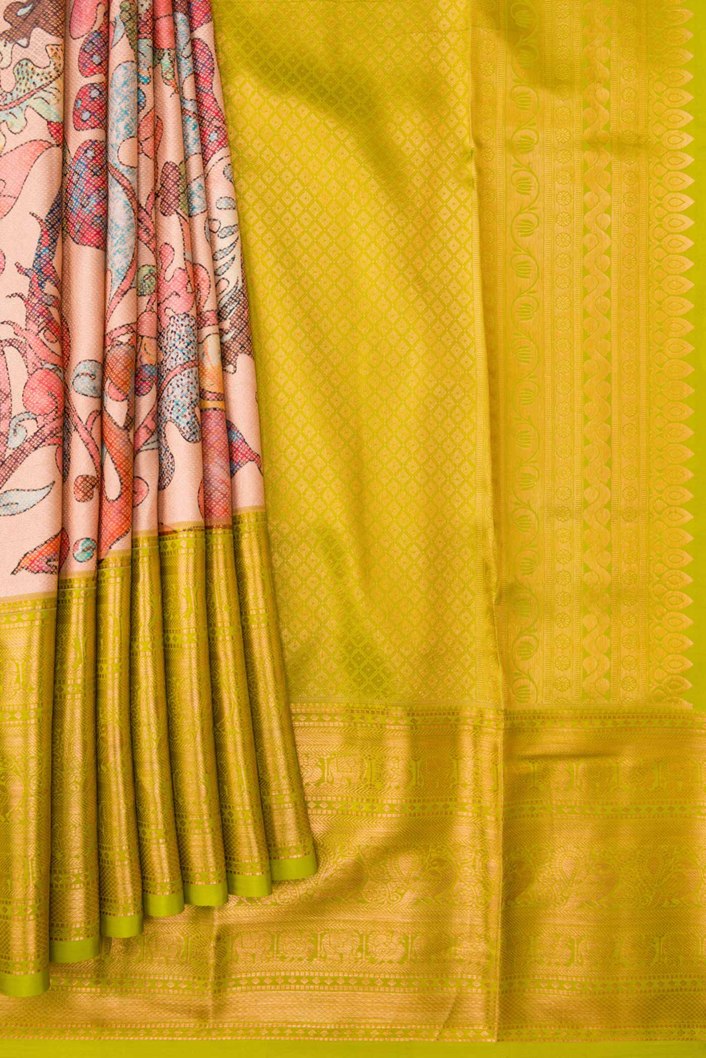 Pleats and pallu of Rose Gold Dual Tone Kanjivaram Silk Saree with Printed design on the body and Zari Border. 
