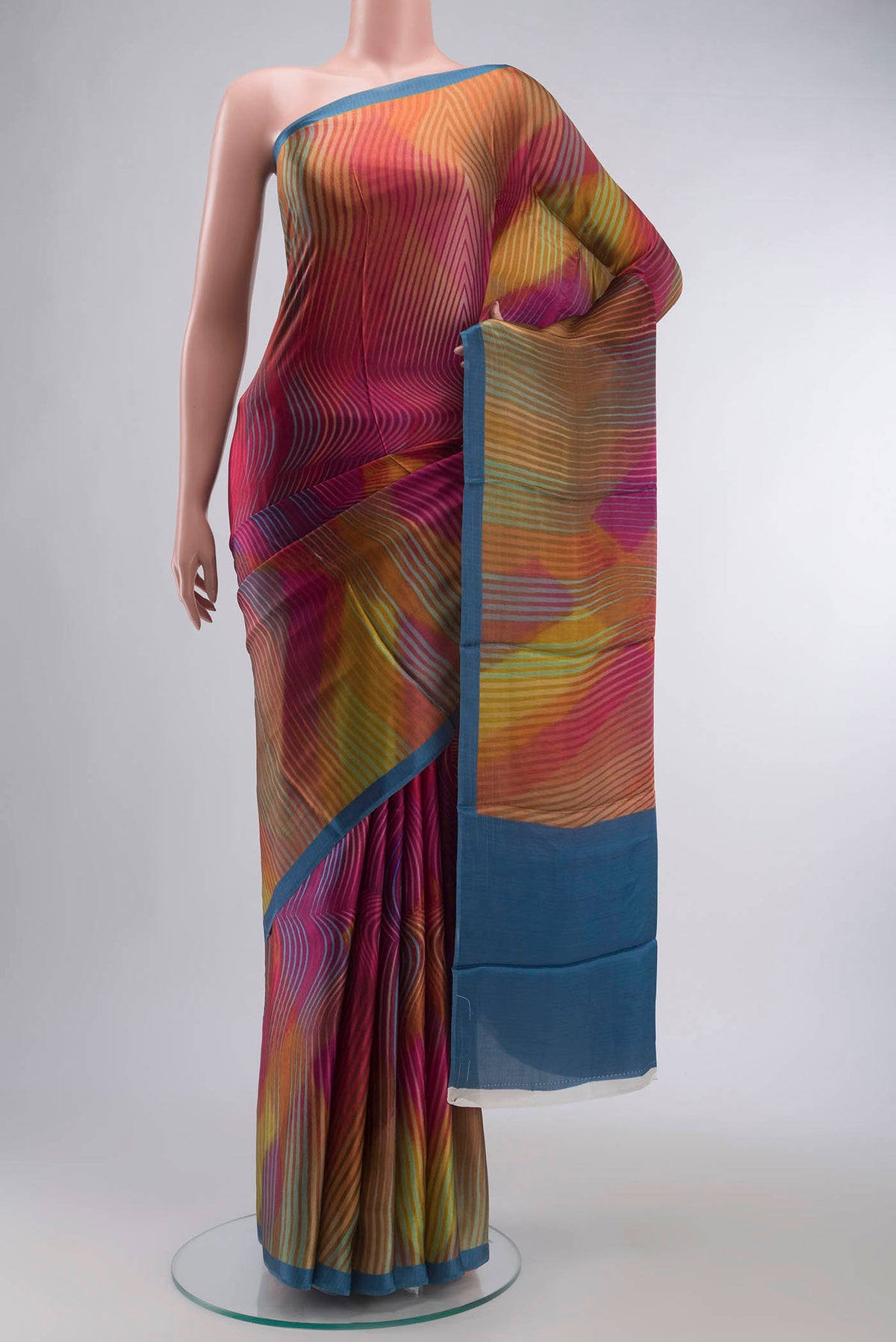 Multi Color Satin Silk Saree with Abstract Print on the body and Plain Border displayed on a mannequin