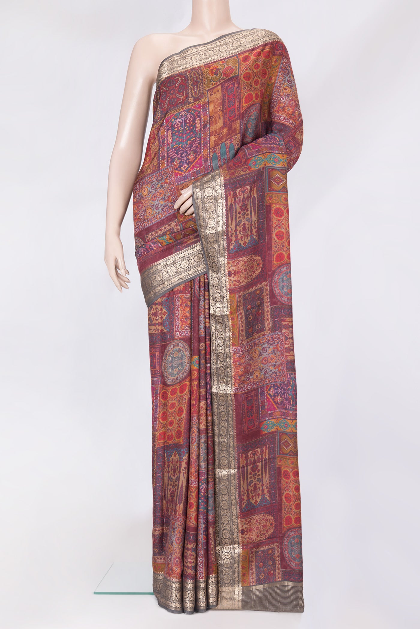 Maroon Dual Tone Kanchipuram Silk Saree with Printed design on the body and Zari Border.  displayed on a mannequin