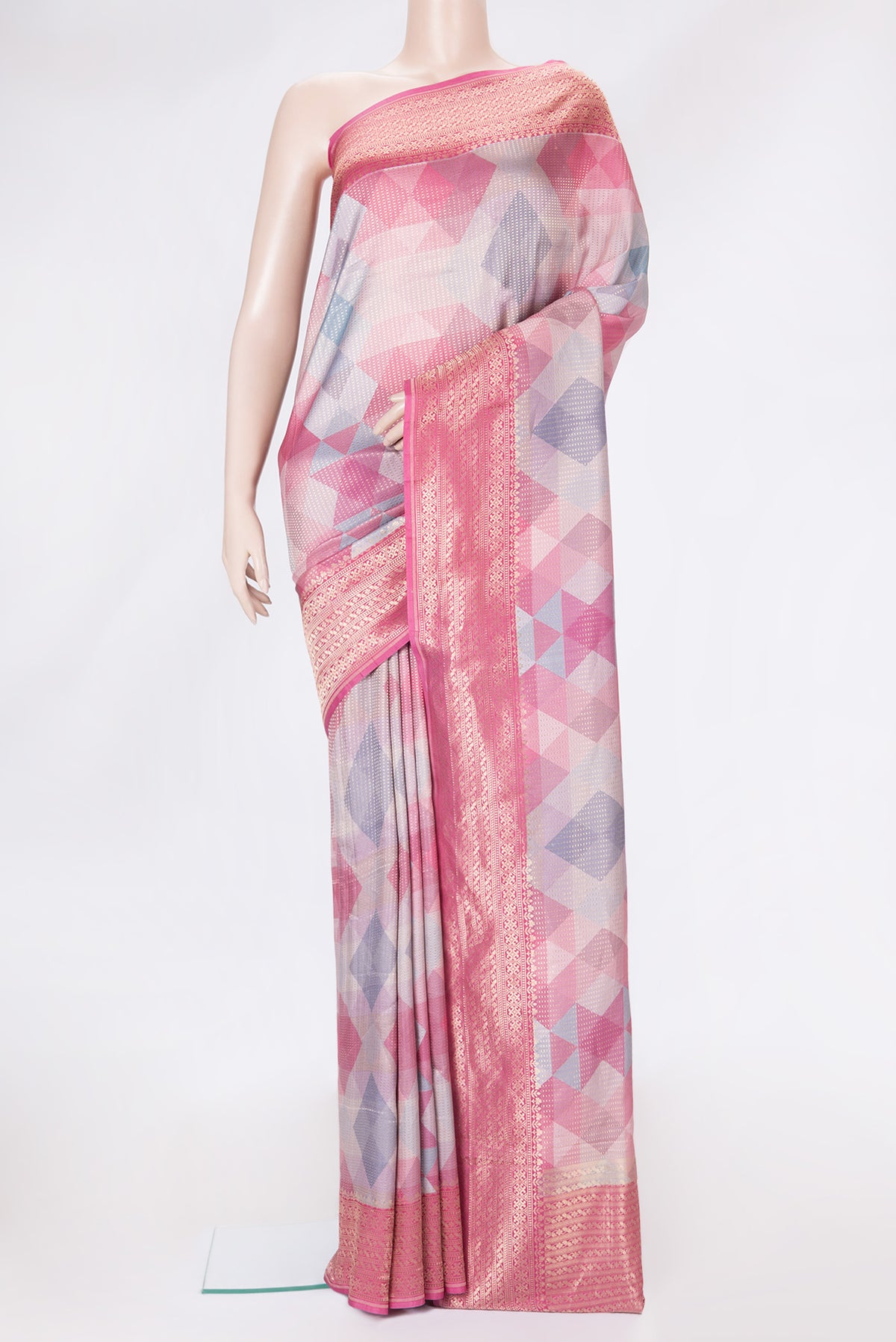 Pink Dual Tone Mysore Crepe Saree with Stripes on the body and Zari Border.  displayed on a mannequin