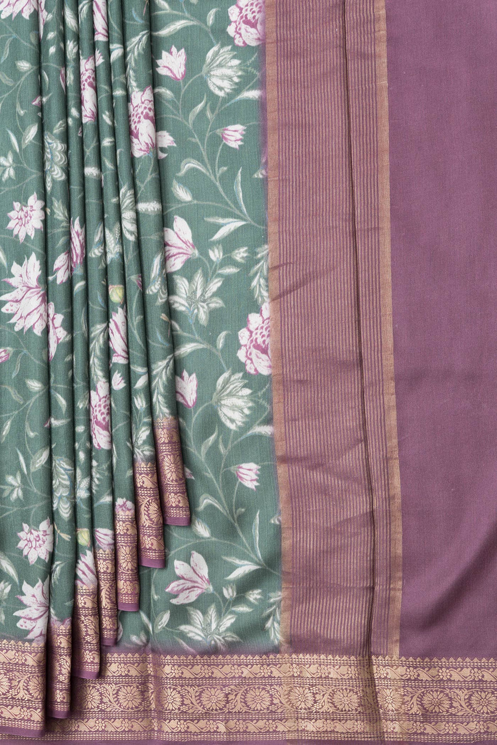 Pleats and pallu of Green Dual Tone Tussar Silk Saree with Printed design on the body and Zari Border. 