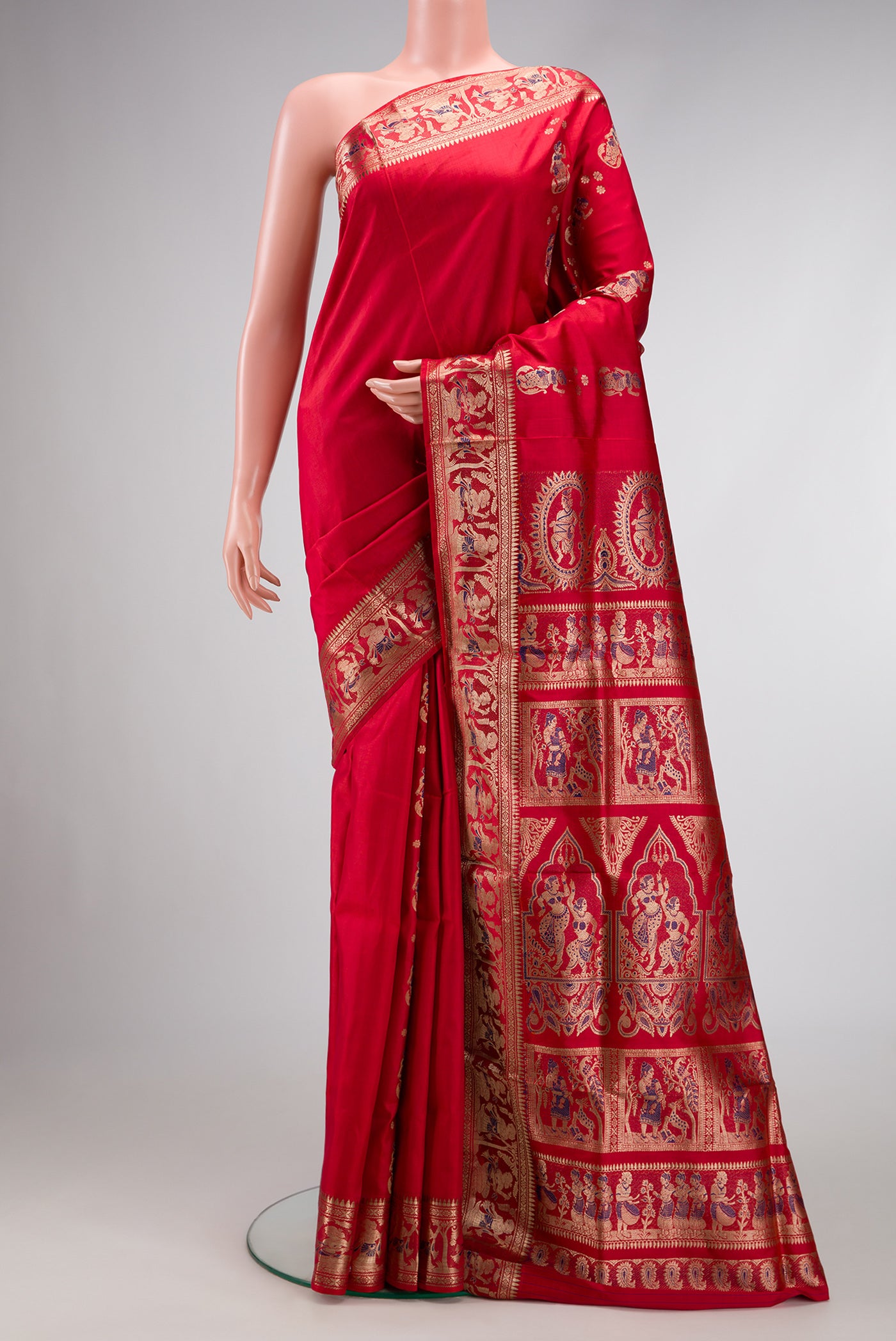 Dark Mauve Dual Tone Baluchari Silk Saree with Zari And Thread Butta on the body and Fancy Border.  displayed on a mannequin