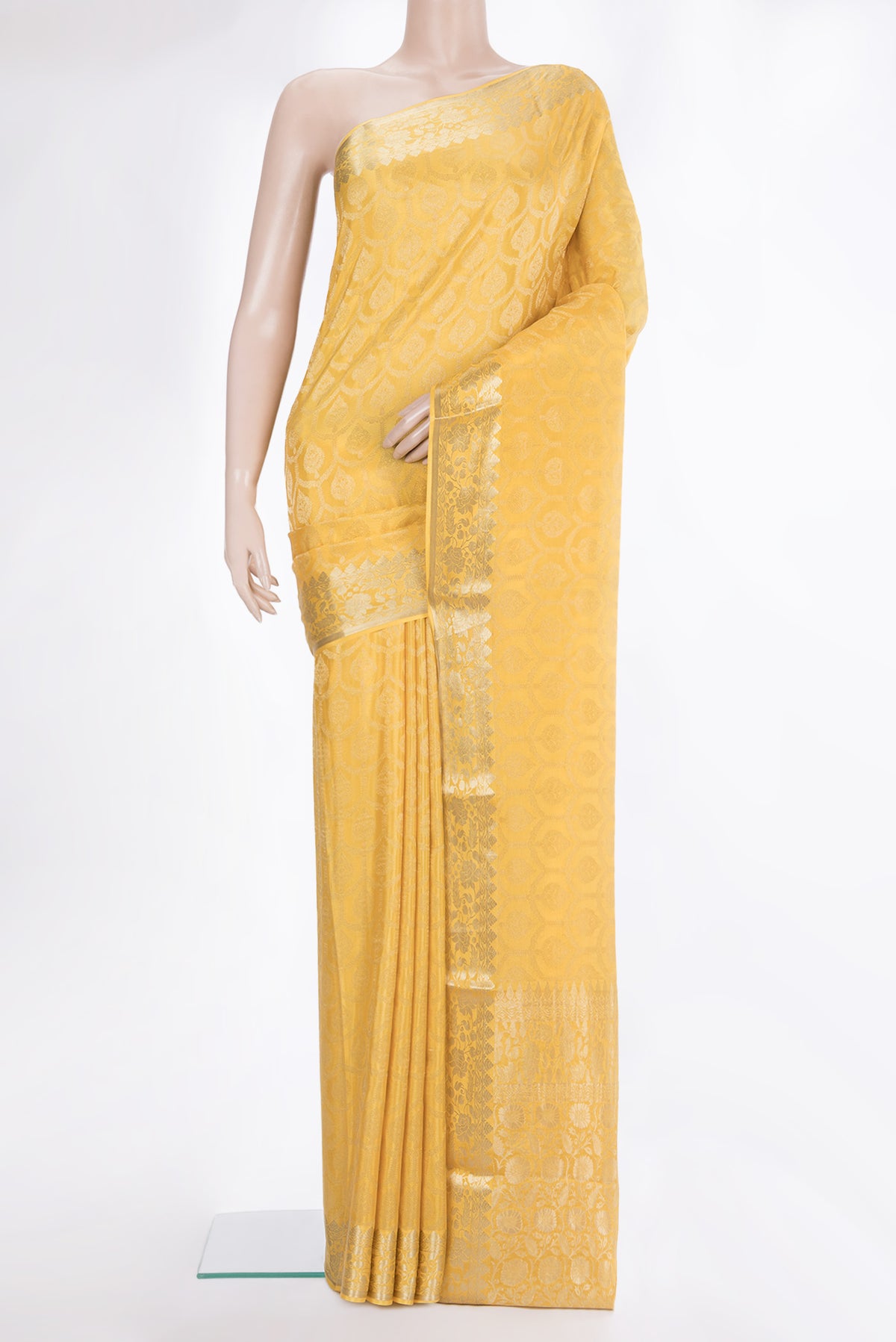 Yellow Dual Tone Georgette Saree with Zari Brocade on the body and Fancy Border.  displayed on a mannequin