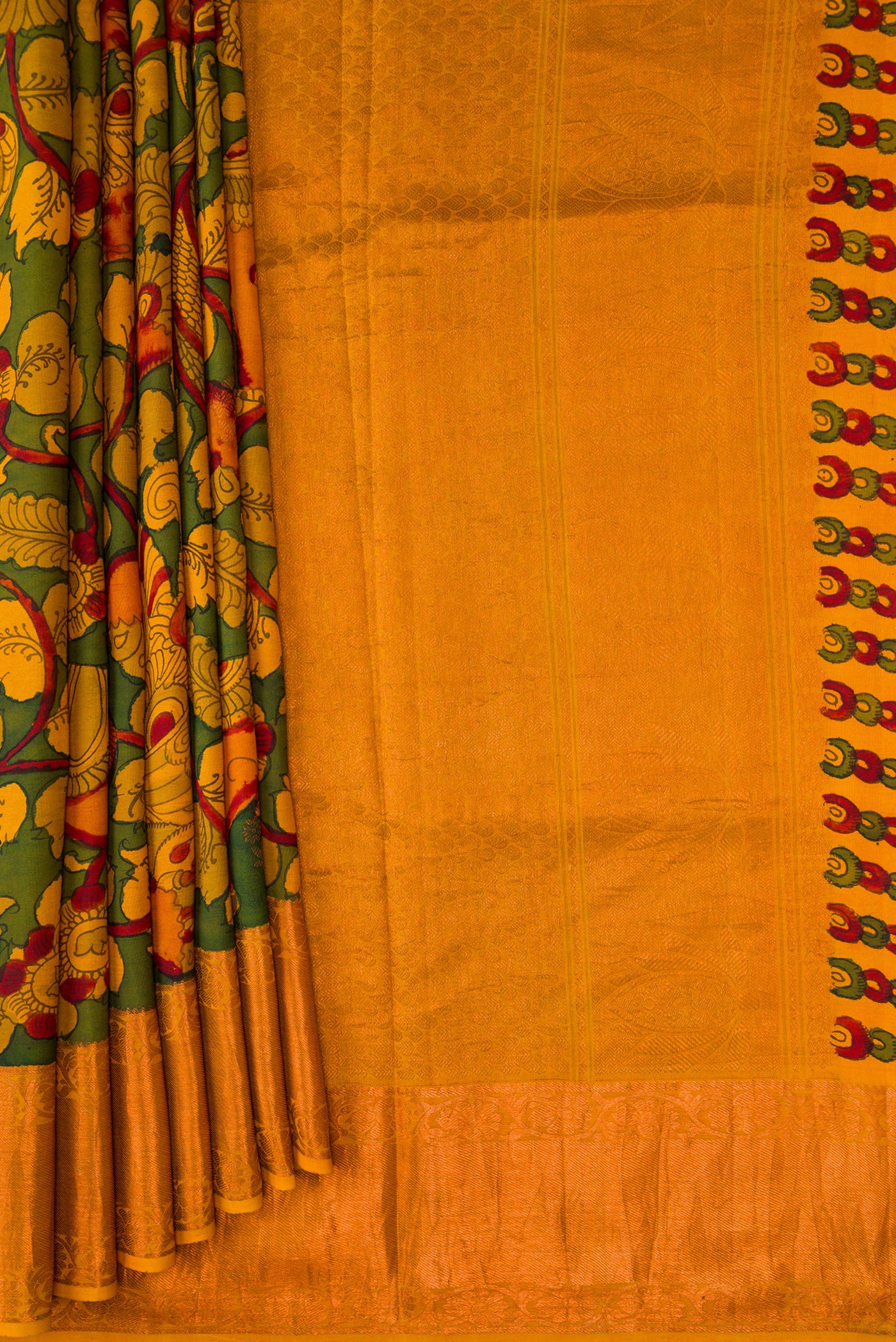 Pleats and pallu of Green Dual Tone Kanchipuram Silk Saree with kalamkari Print on the body and Zari Border. 