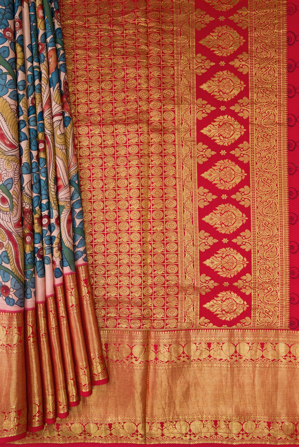 Pleats and pallu of Golden Peach Dual Tone Kanchipuram Silk Saree with kalamkari Print on the body and Zari Border. 