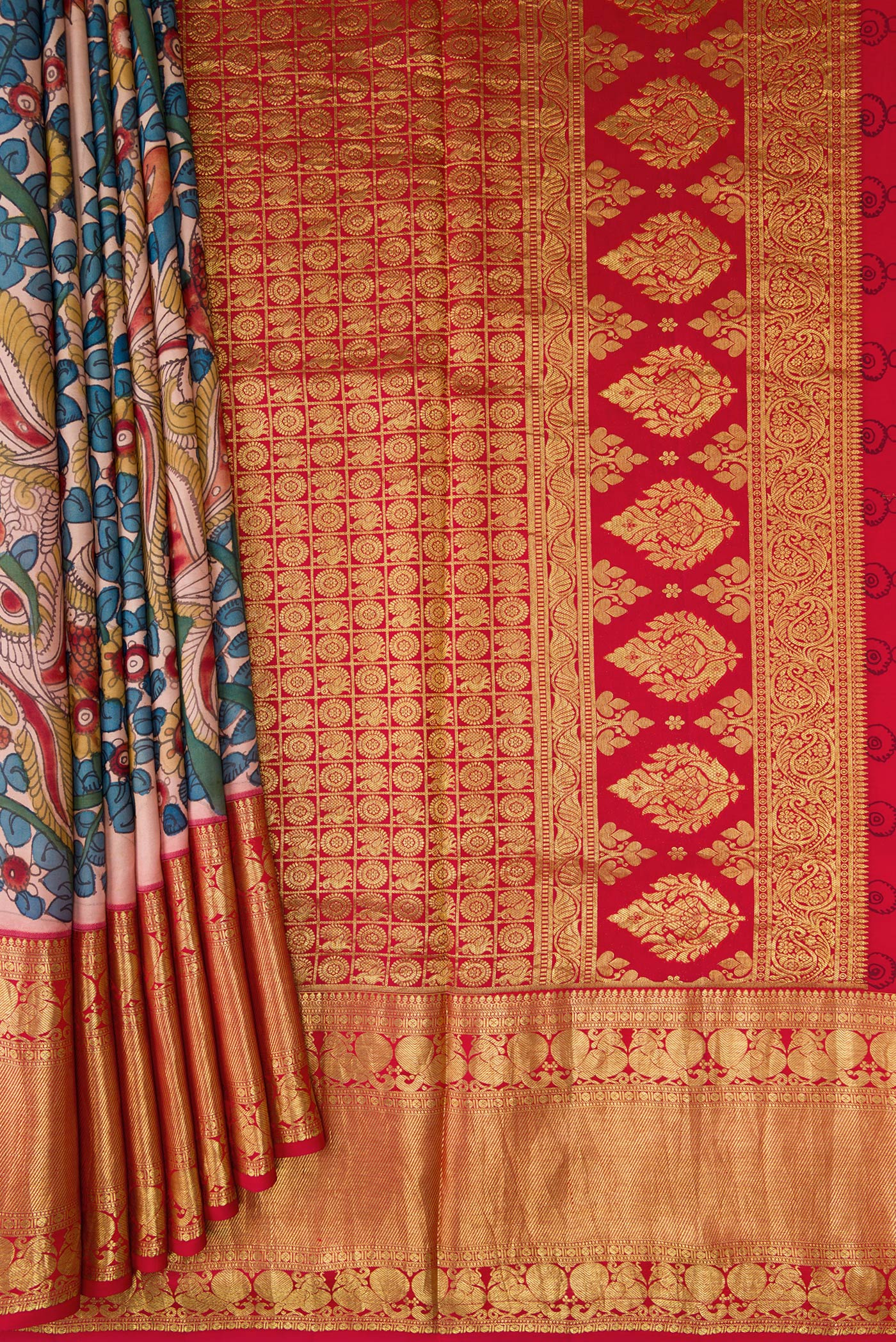 Pleats and pallu of Golden Peach Dual Tone Kanchipuram Silk Saree with kalamkari Print on the body and Zari Border. 