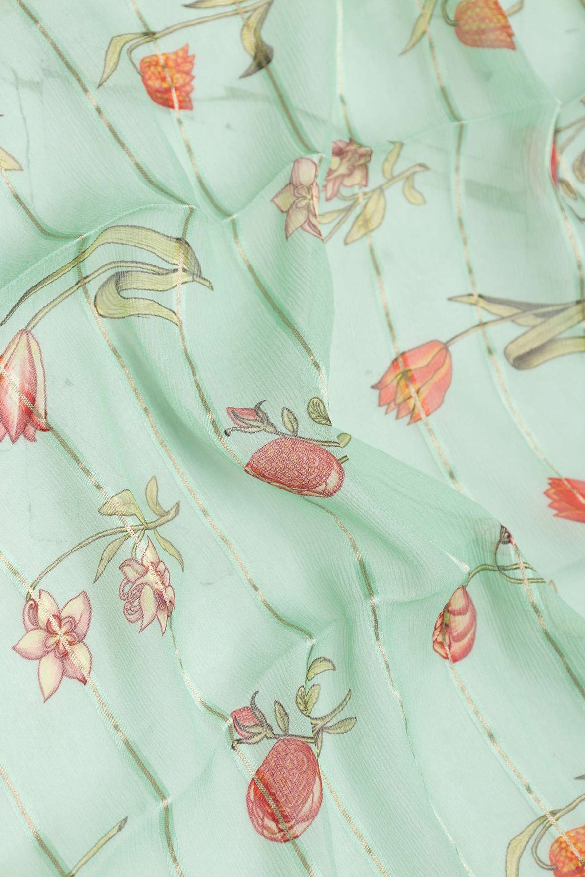 Close up of Sea Green Dual Tone Mysore Georgette Saree with Stripes on the body and Zari Border displaying folds