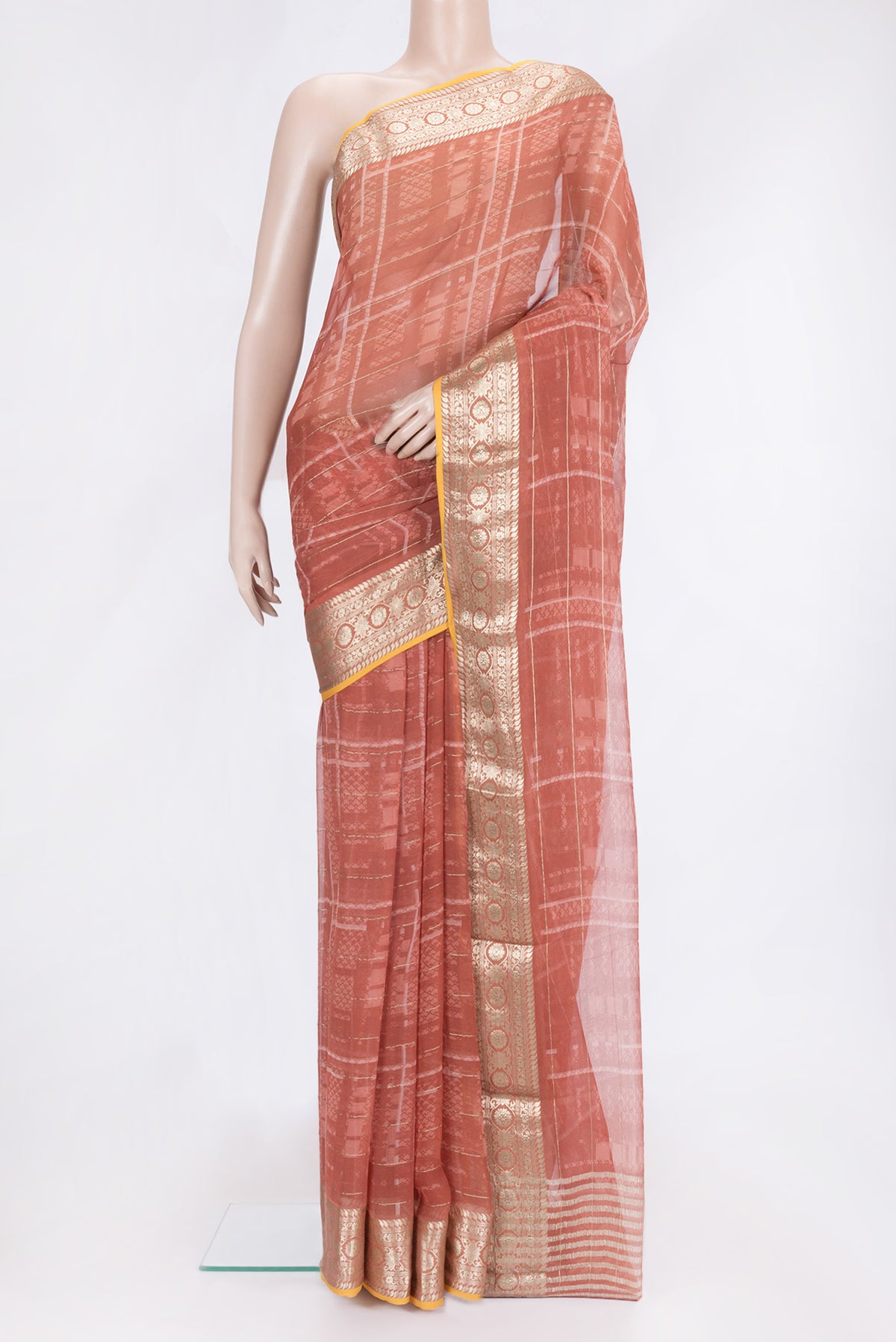 Bronze Dual Tone Mysore Georgette Saree with Printed design on the body and Zari Border.  displayed on a mannequin