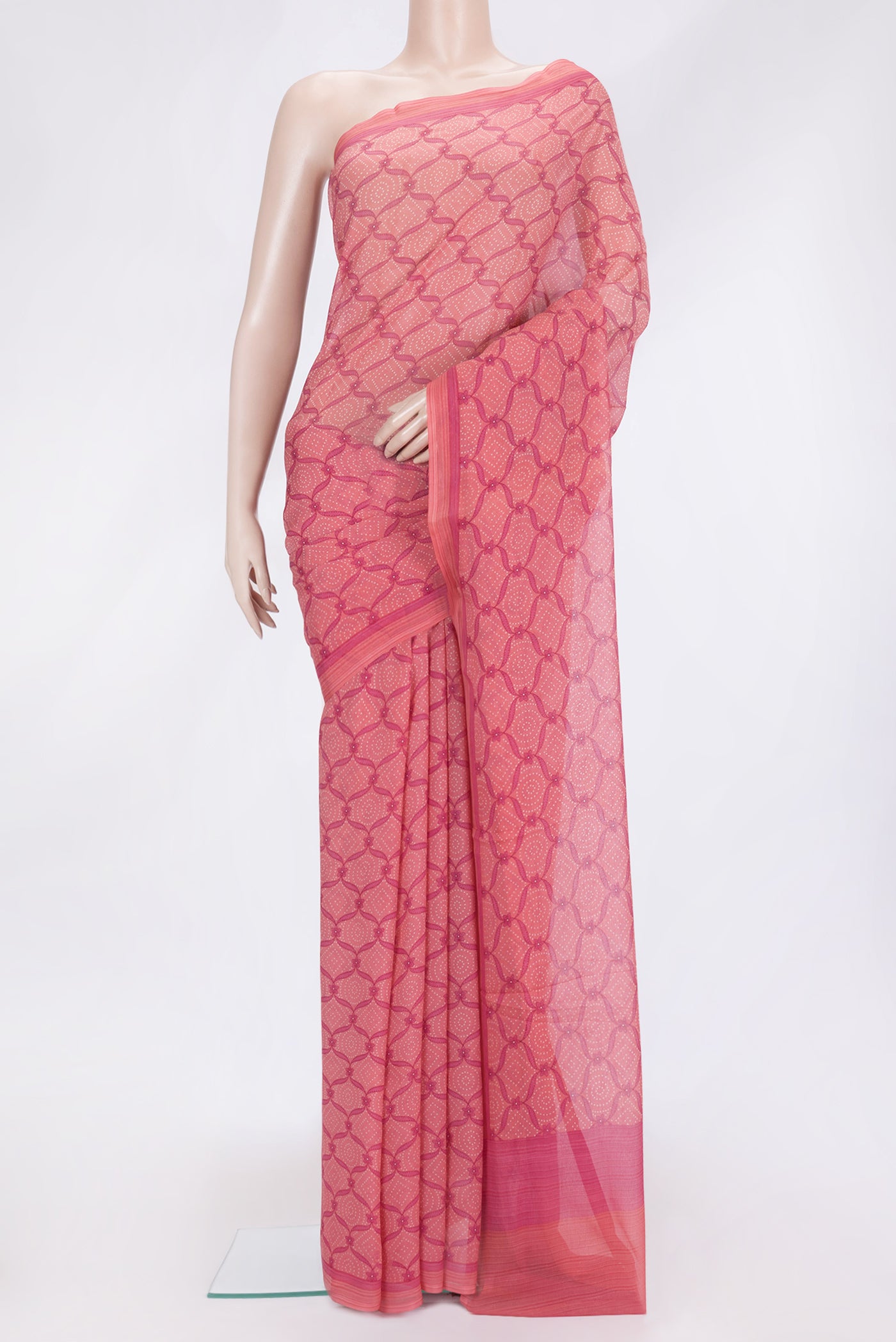 Pink Dual Tone Mysore Chiffon Saree with Printed design on the body and Printed Border.  displayed on a mannequin